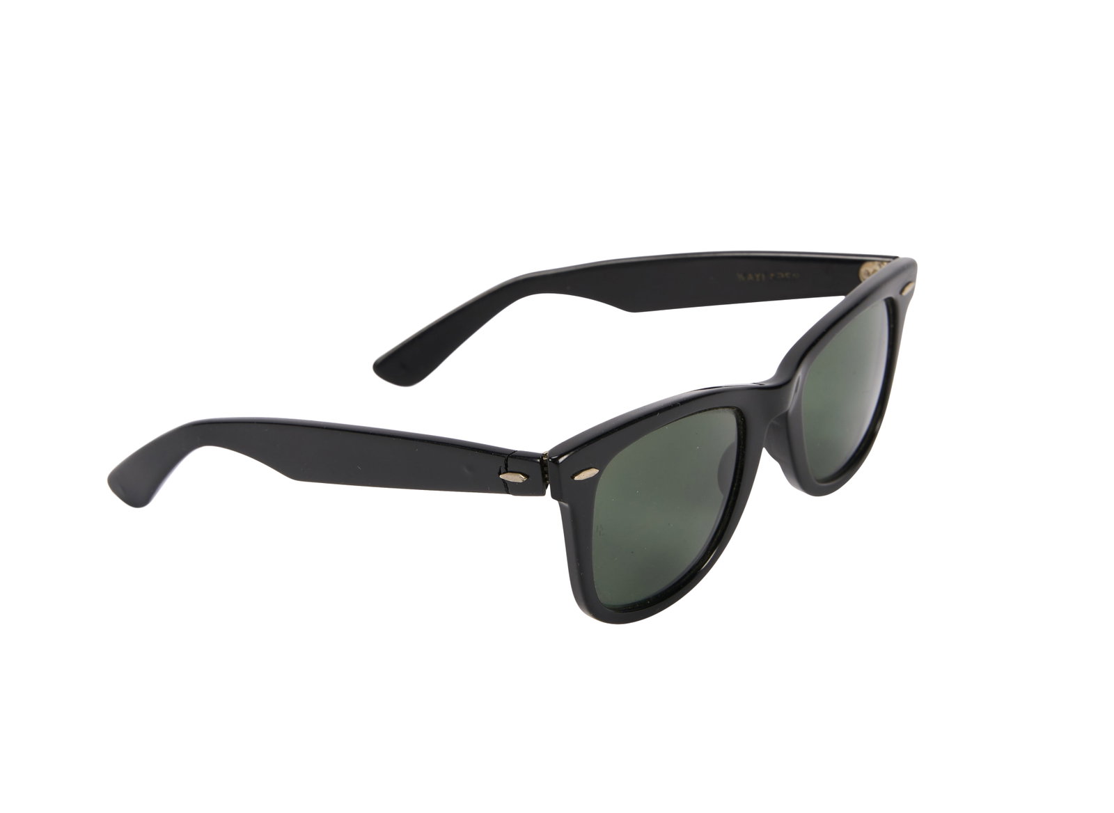 John Belushi | "The Blues Brothers" 1980 Summer Tour Sunglasses: A pair of vintage Ray Ban Wayfarer sunglasses worn by John Belushi as "Jake Blues" during the Blues Brothers' "Road to Ruin" summer tour that took place from June 27, 1980, until August 1, 1980. The