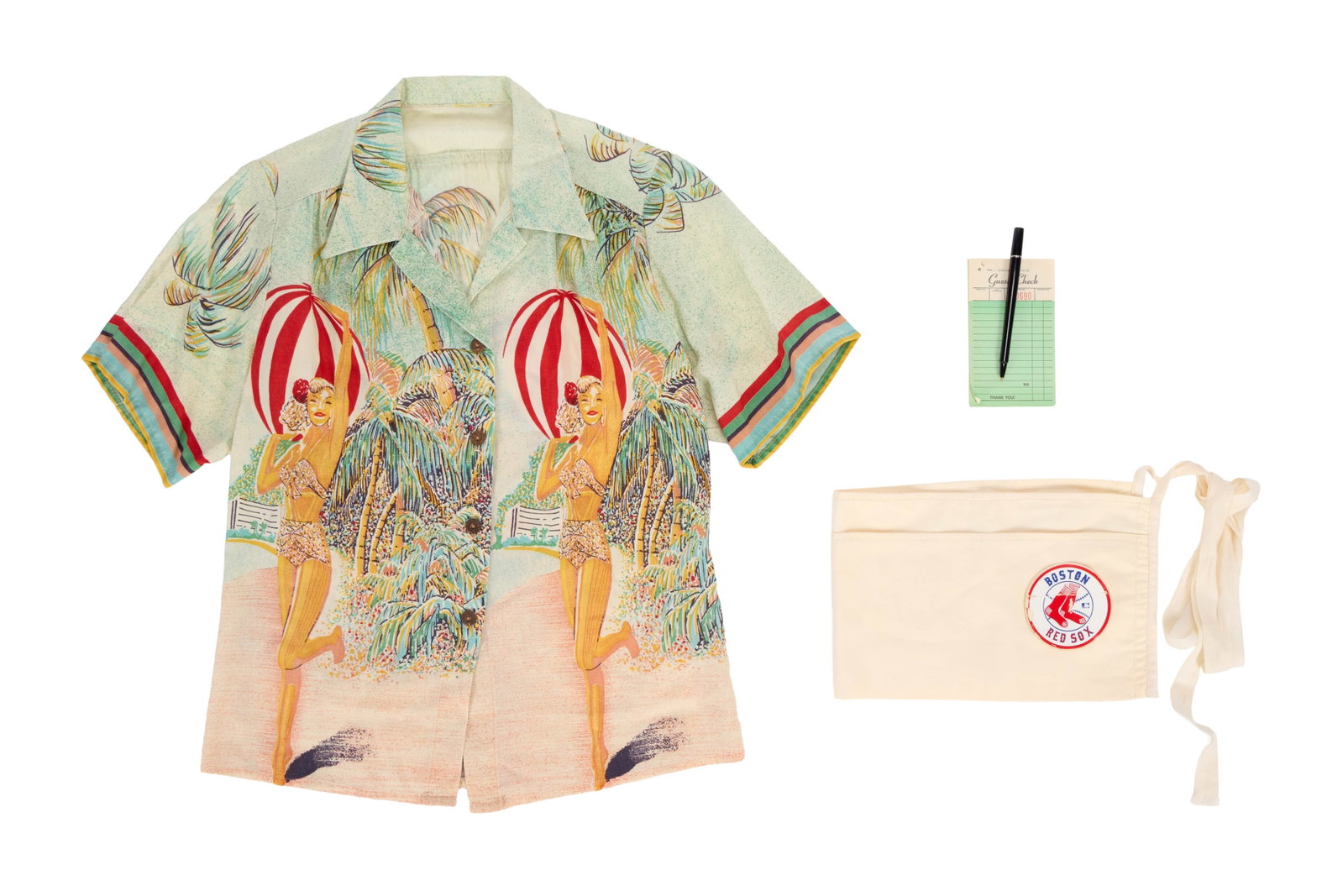 Cheers | Carla Tortelli's (Rhea Pearlman) Shirt, Bar Apron, and Accessories: A shirt, bar apron, and set of accessories for Carla Tortelli (Rhea Pearlman) from the long-running sitcom Cheers (NBC, 1982 - 1993). The short sleeve button up shirt features a patterned print of
