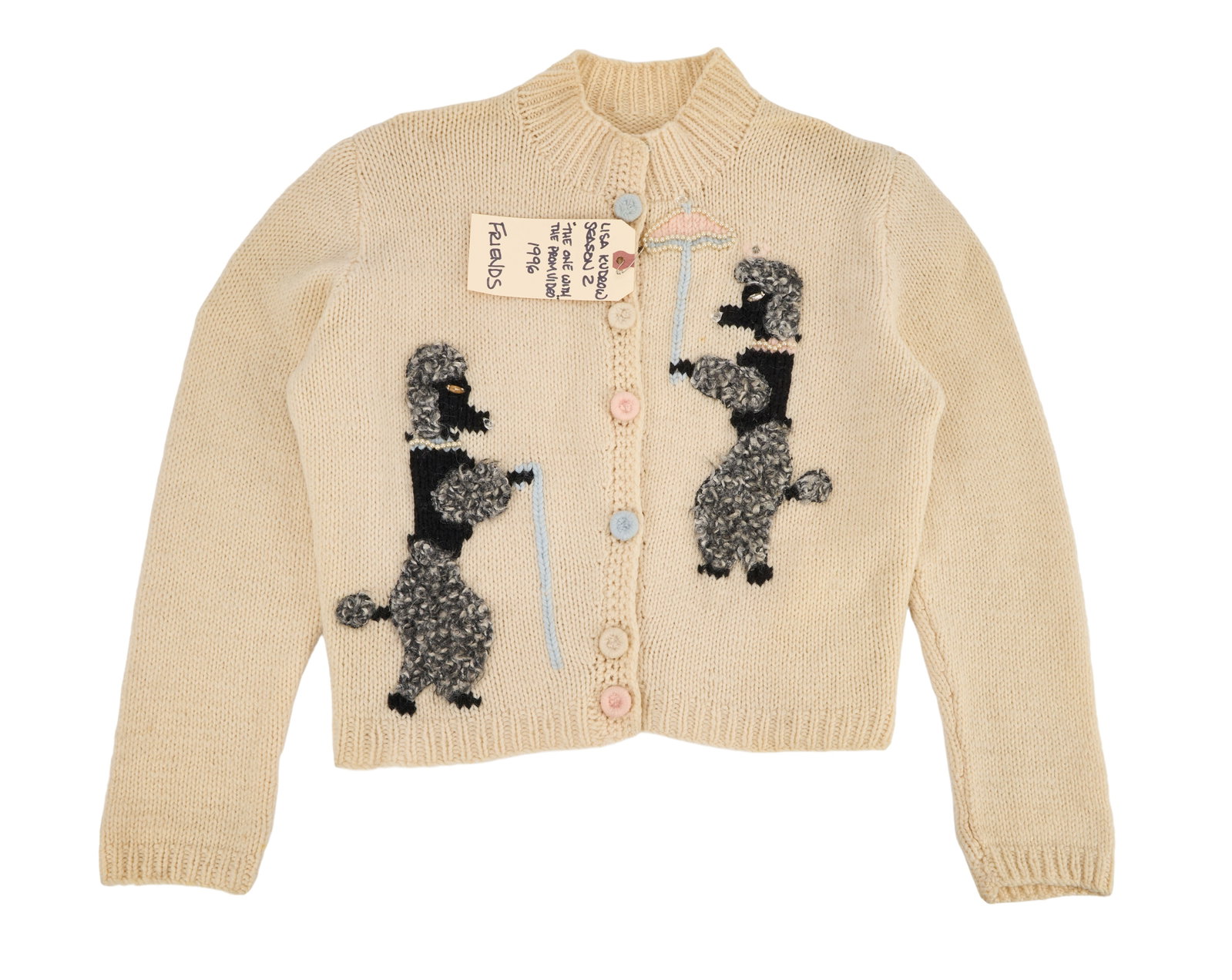 Friends | Phoebe Buffay's (Lisa Kudrow) Poodle Cardigan from "The One With The Prom Video": The knit poodle cardigan worn by Lisa Kudrow as Phoebe Buffay in the 14th episode of the second season of Friends (NBC, 1994 - 2004), "The One With The Prom Video." The cream-colored cardigan