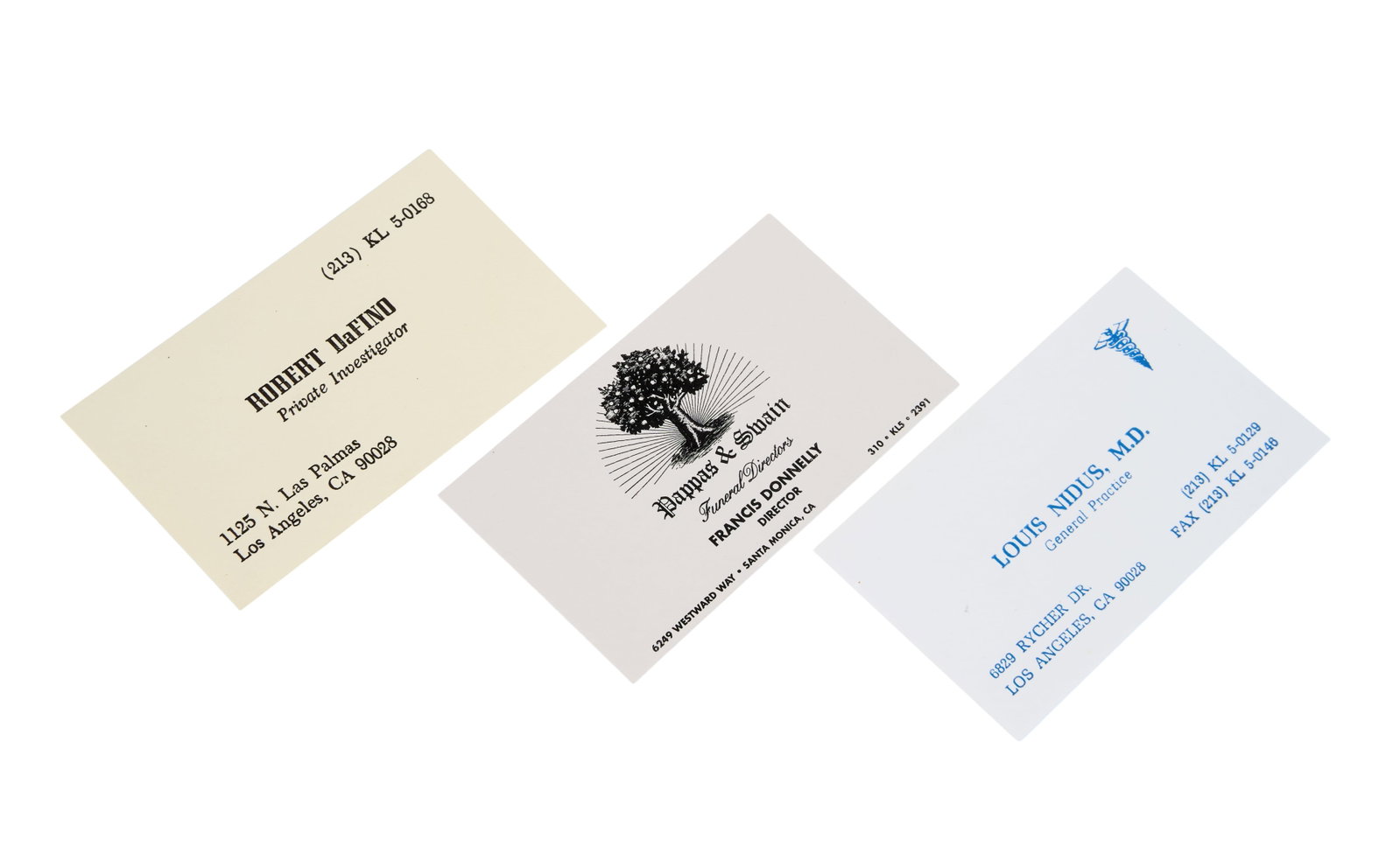 The Big Lebowski | Production-Made Character Business Cards: A trio of production-made props from the Coen Brothers' neo-noir comedy classic The Big Lebowski (Working Title Films, 1998). Each of the three is a business card, custom designed and printed for thre