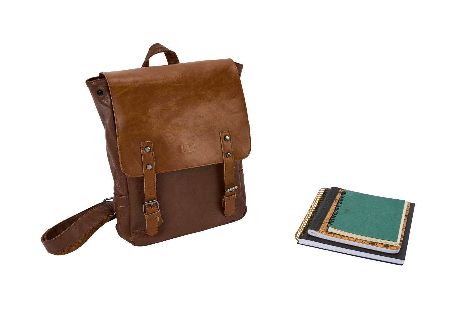 Bottoms | Hazel Callahan (Ruby Cruz) Screen-Used Notebook Set and Laptop Bag: Three notebook and a backpack used by Ruby Cruz as Hazel Callahan in the film Bottoms (Metro-Goldwyn-Mayer Pictures, 2023) directed by Emma Seligman. A brown LXY leather laptop bag; inside the bag