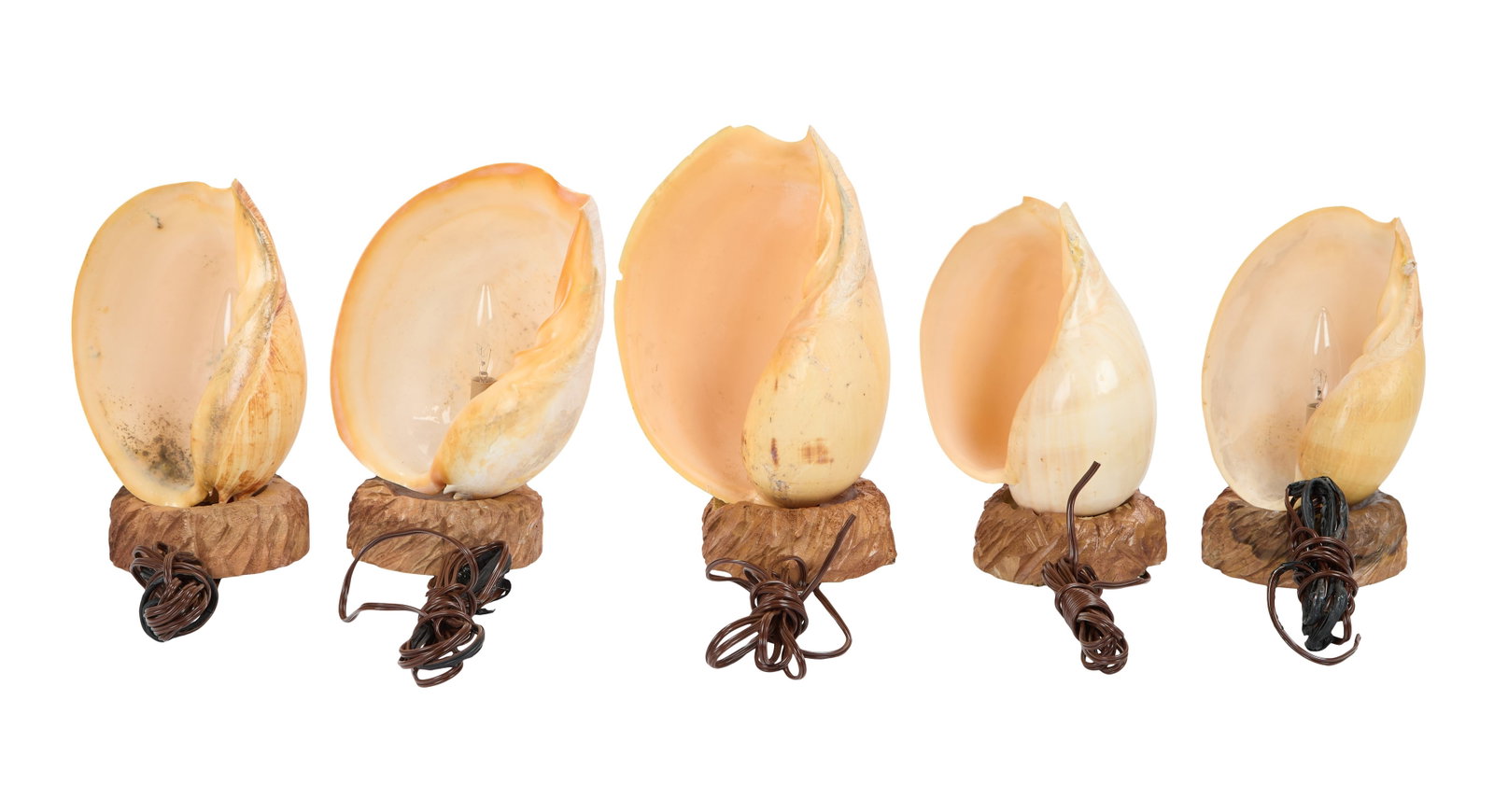 The Flintstones in Viva Rock Vegas | Five Shell Table Lamps : Five shell table lamps from the production of the prehistoric prequel The Flintstones in Viva Rock Vegas (Universal, 2000). Each lamp is comprised of a plastic shell and a carved wooden base. A