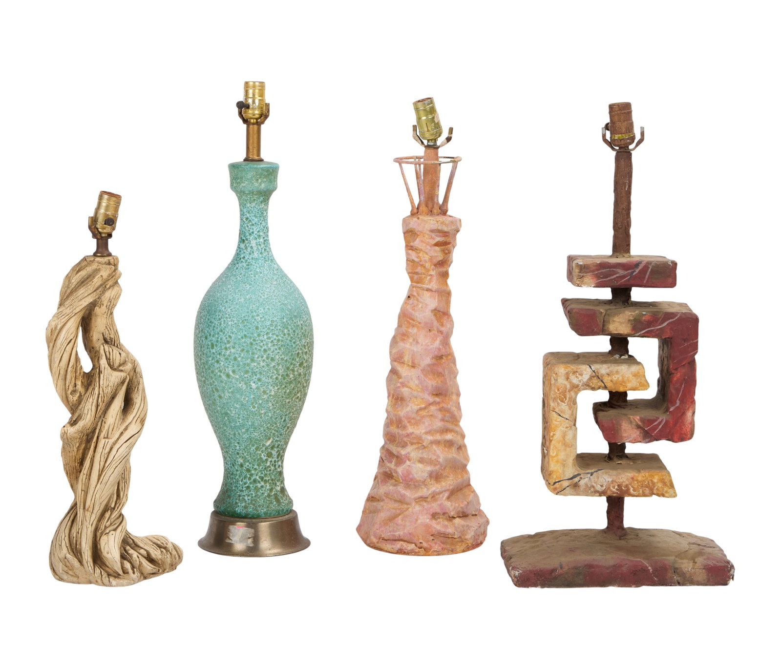 The Flintstones in Viva Rock Vegas | Four Desk Lamps : Four desk lamps from the production of the prehistoric prequel The Flintstones in Viva Rock Vegas (Universal, 2000). All in different styles. Three of the lamps contain bodies comprised of carved