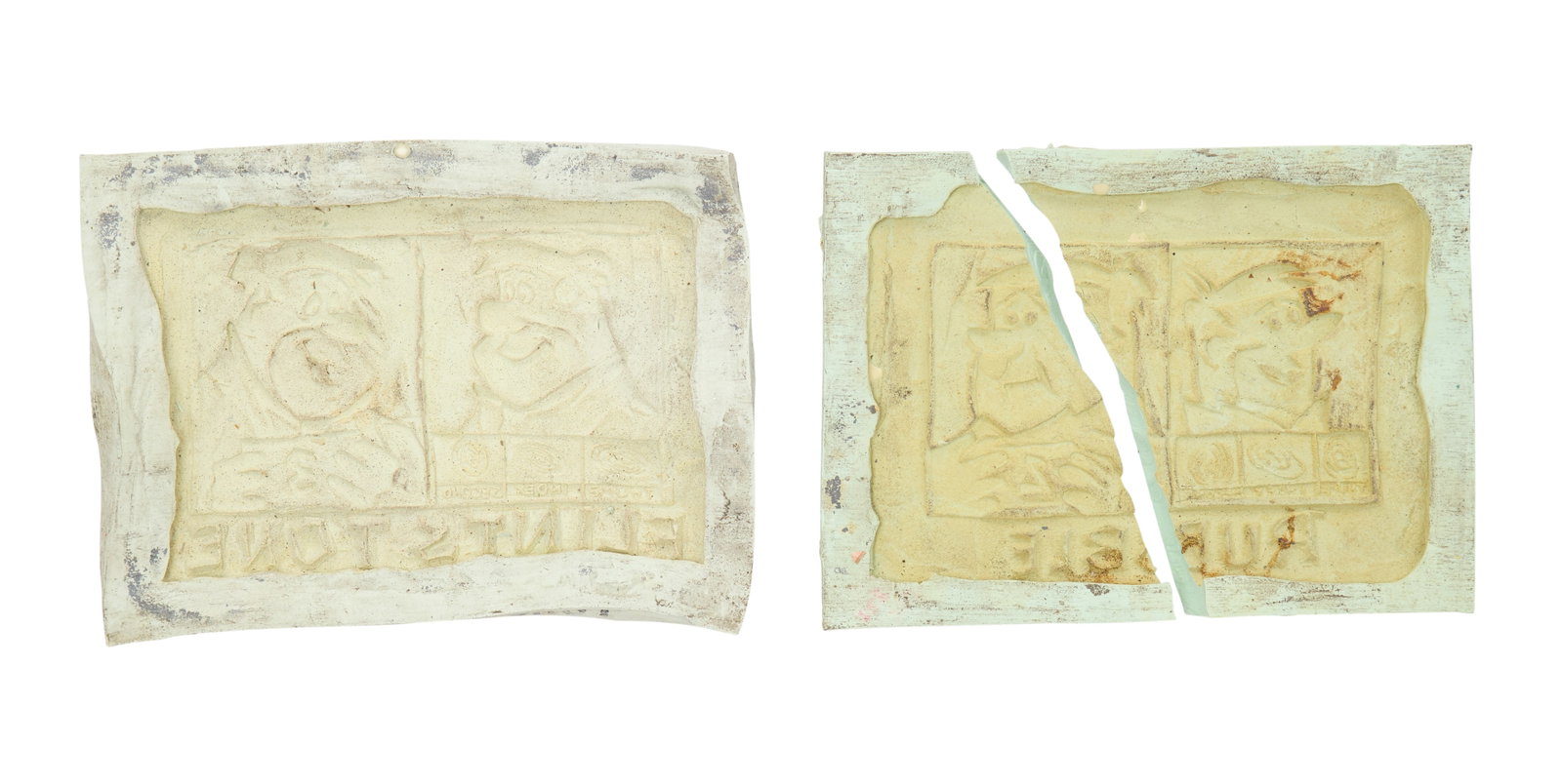 The Flintstones in Viva Rock Vegas | Fred Flintstone and Barney Rubble Mugshot Molds: Two molds for the mugshots of Fred Flintstone and Barney Rubble from the production of the prehistoric prequel The Flintstones in Viva Rock Vegas (Universal, 2000). Each silicone mold contains an