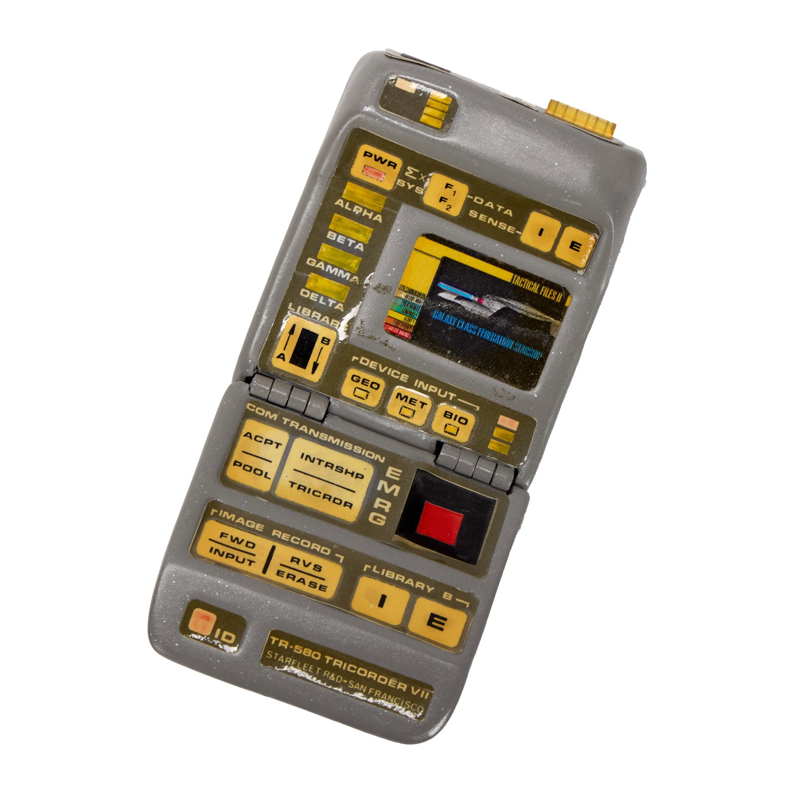 Star Trek: The Next Generation | Starfleet Mark VII Static Tricorder Prop: An original TR-580 Mark VII Static Tricorder prop from the production of Star Trek: The Next Generation (Syndicated, 1987-1994). Made from grey, vacuum-formed plastic with decals of buttons, labels, a