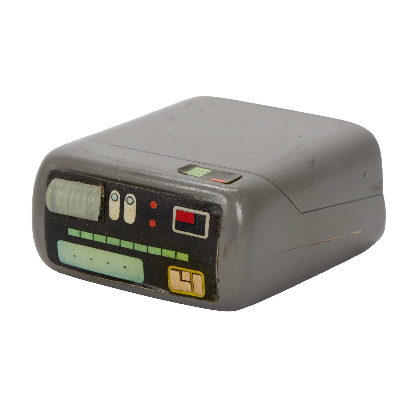 Star Trek: The Next Generation | Starfleet Mark VII Holster Tricorder Prop: A Starfleet Mark VII holster tricorder prop from the production of Star Trek: The Next Generation (Syndicated, 1987-1994). Made from gray, vacuum formed plastic, with a large decal on top and a small 