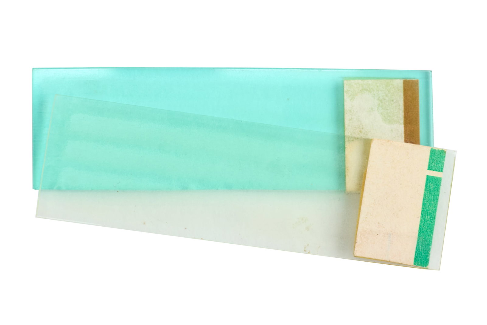 Star Trek: The Next Generation | Two Isolinear Chips: Two isolinear chip props from the early seasons of Star Trek: The Next Generation (Syndicated, 1987-1994). The isolinear chips are composed of a transparent acrylic material and feature stickers at th