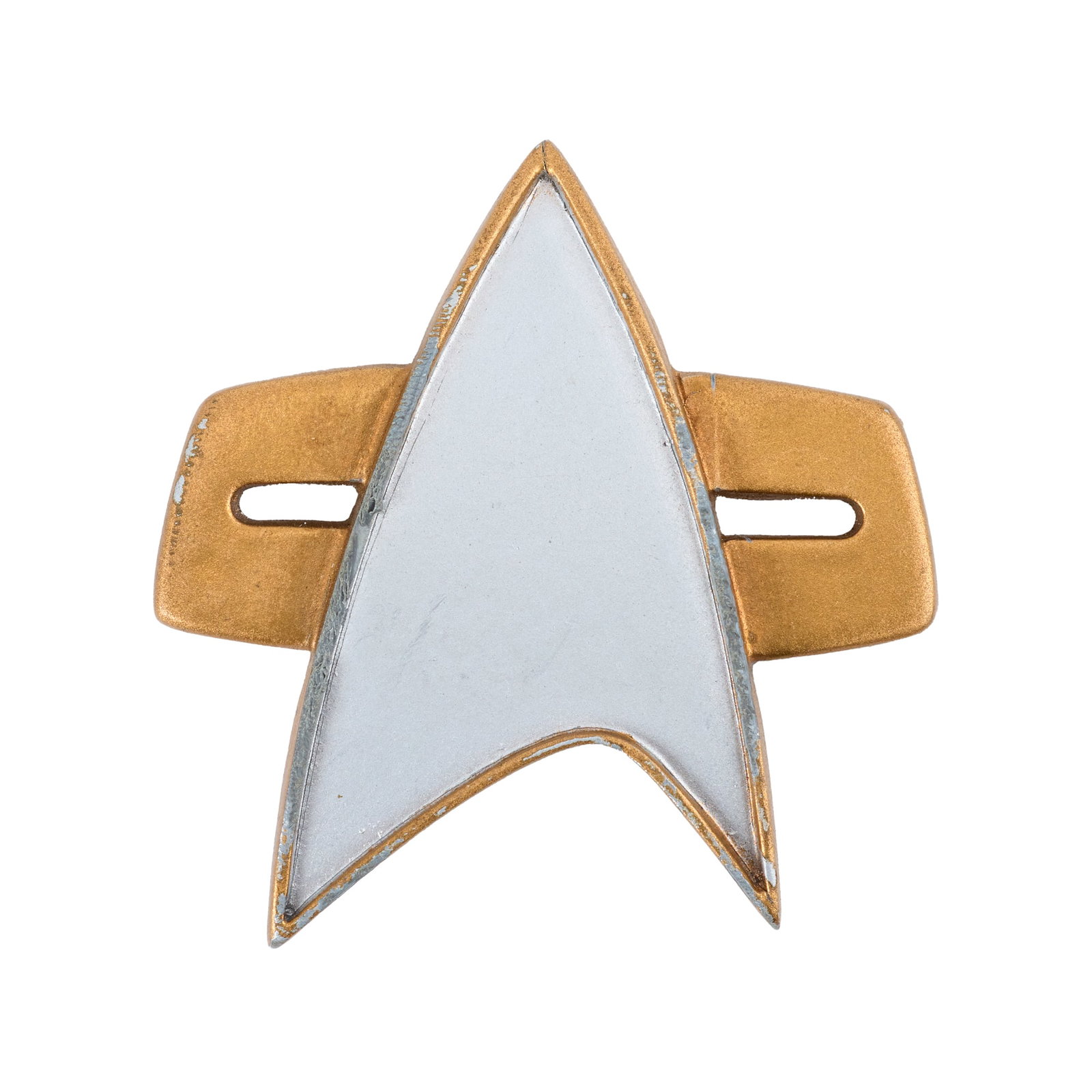 Star Trek: Deep Space Nine | Tom Riker's Combadge Prop: A combadge prop worn by Lieutenant Tom Riker (Jonathan Frakes) during "Defiant," a third season episode of Star Trek: Deep Space Nine (Syndicated, 1993-1999), which first aired November 21, 1994.