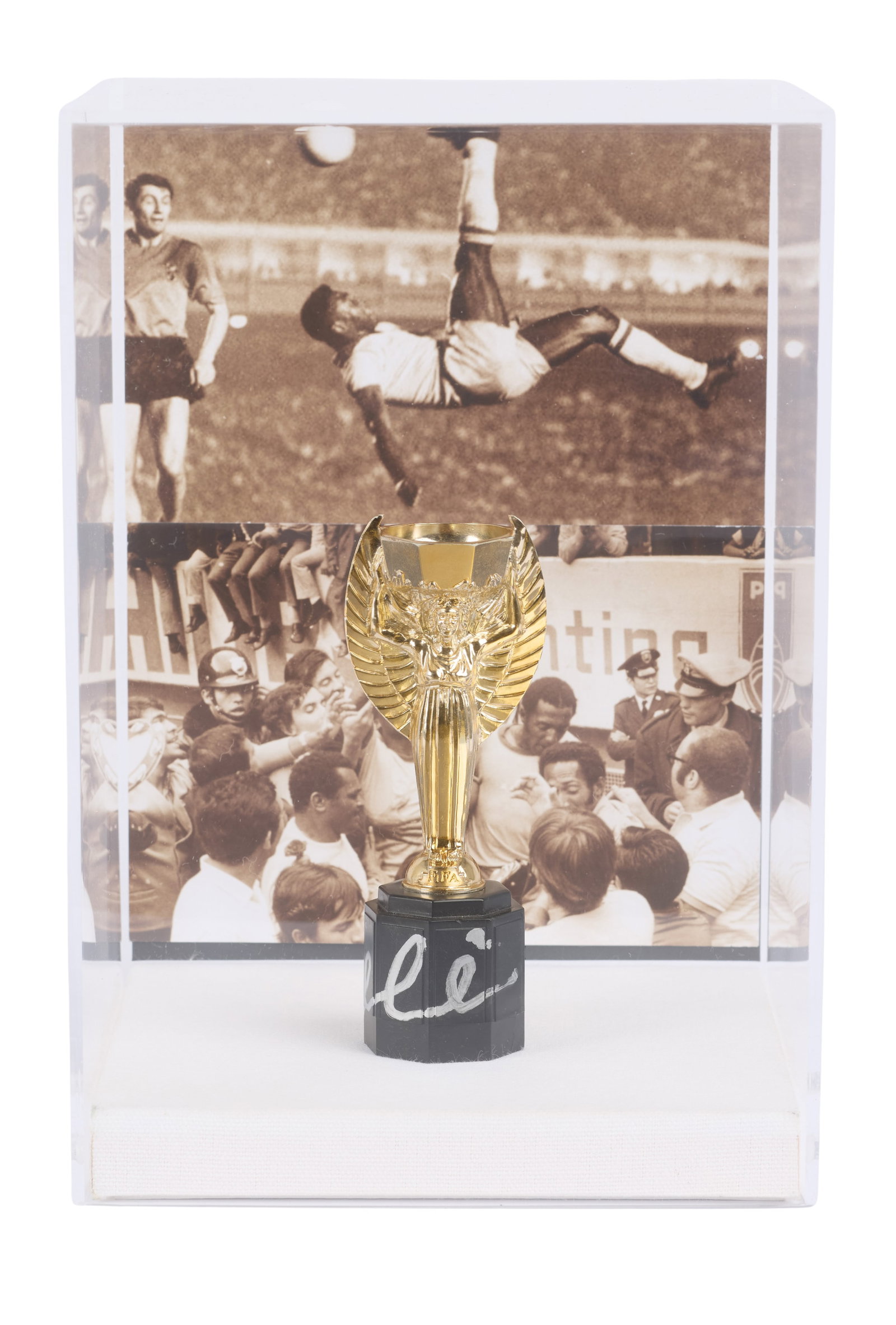 Pele | Signed Jules Rimet Replica Trophy: A small-scale Jules Rimet replica trophy, hand-signed by Pele in silver marker, and housed in an acrylic display case.