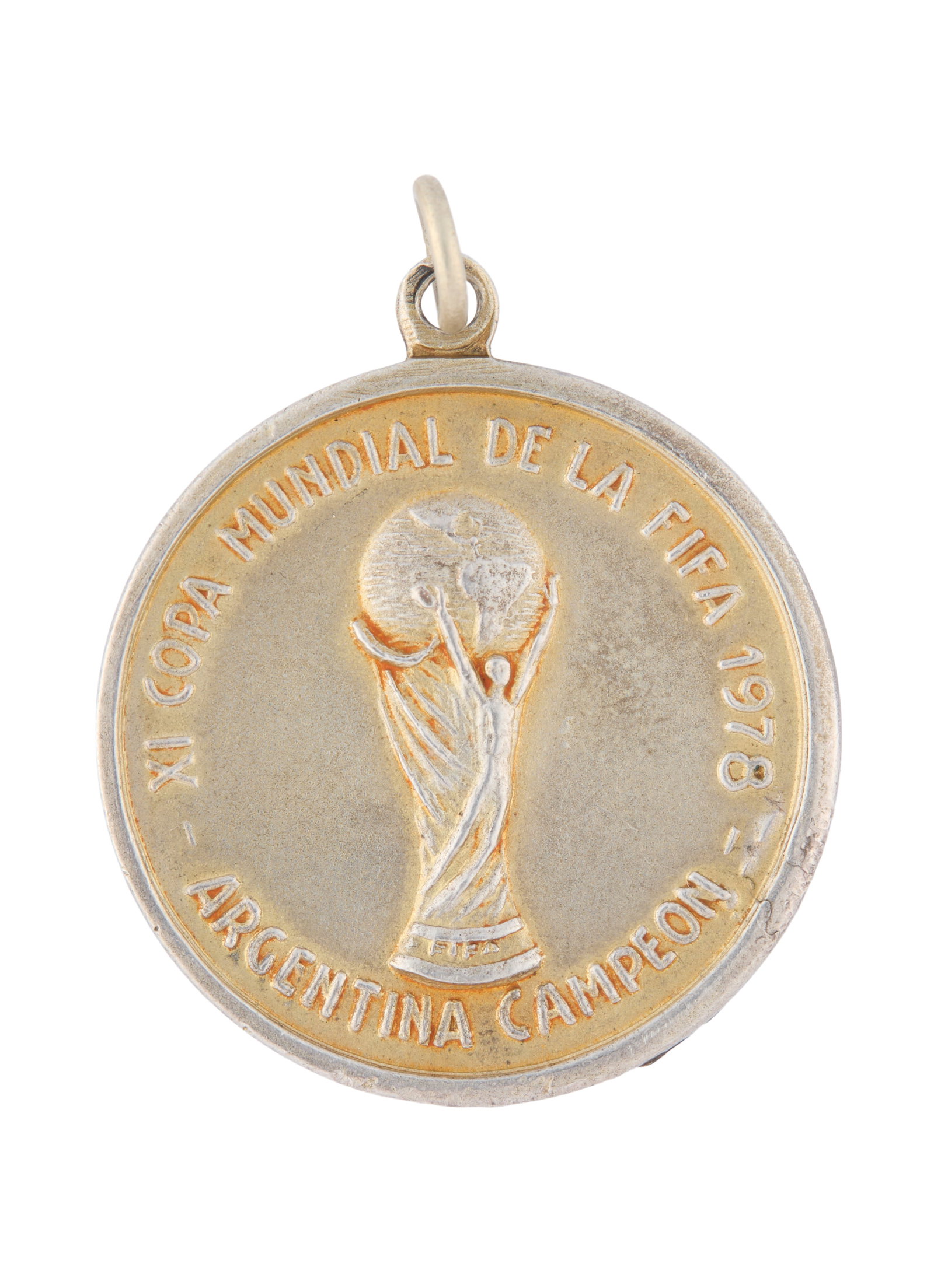 R. Di Pietro | 1978 World Cup AFA Commemorative Medal: A medal commemorating the 1978 World Cup, produced by the Argentine Football Association and presented to R. Di Pietro, who reportedly served as a team delegate during the event, and later gifted the 