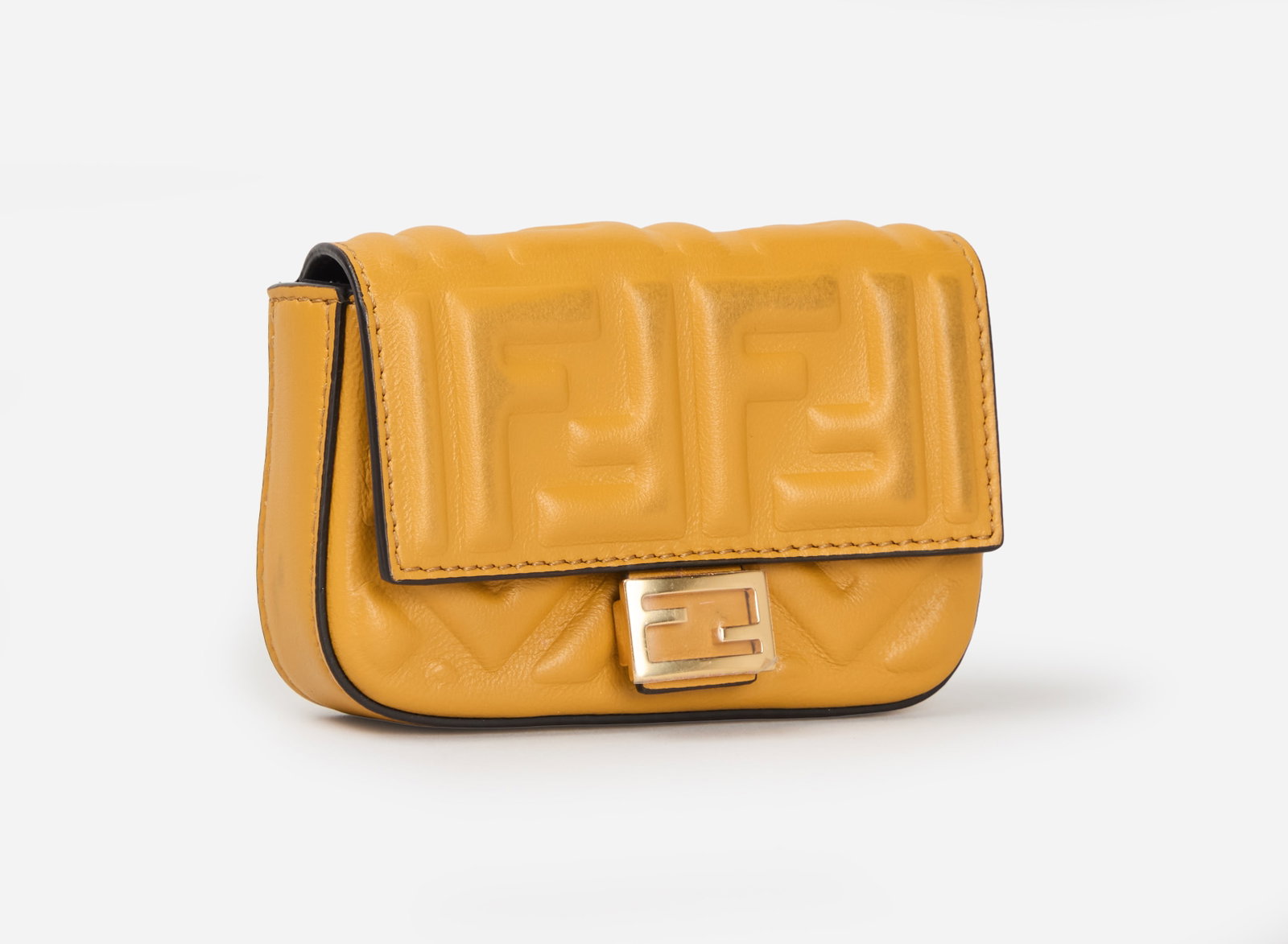 Fendi | 2022 Nappa Matisse FF Embossed Nano Baguette Charm Zucca: Fendi yellow Nappa Matisse FF Embossed Nano Baguette Charm Zucca from 2022, from the collection of Cameron Silver. This nano baguette is crafted of FF embossed lambskin leather in golden brown. It fea