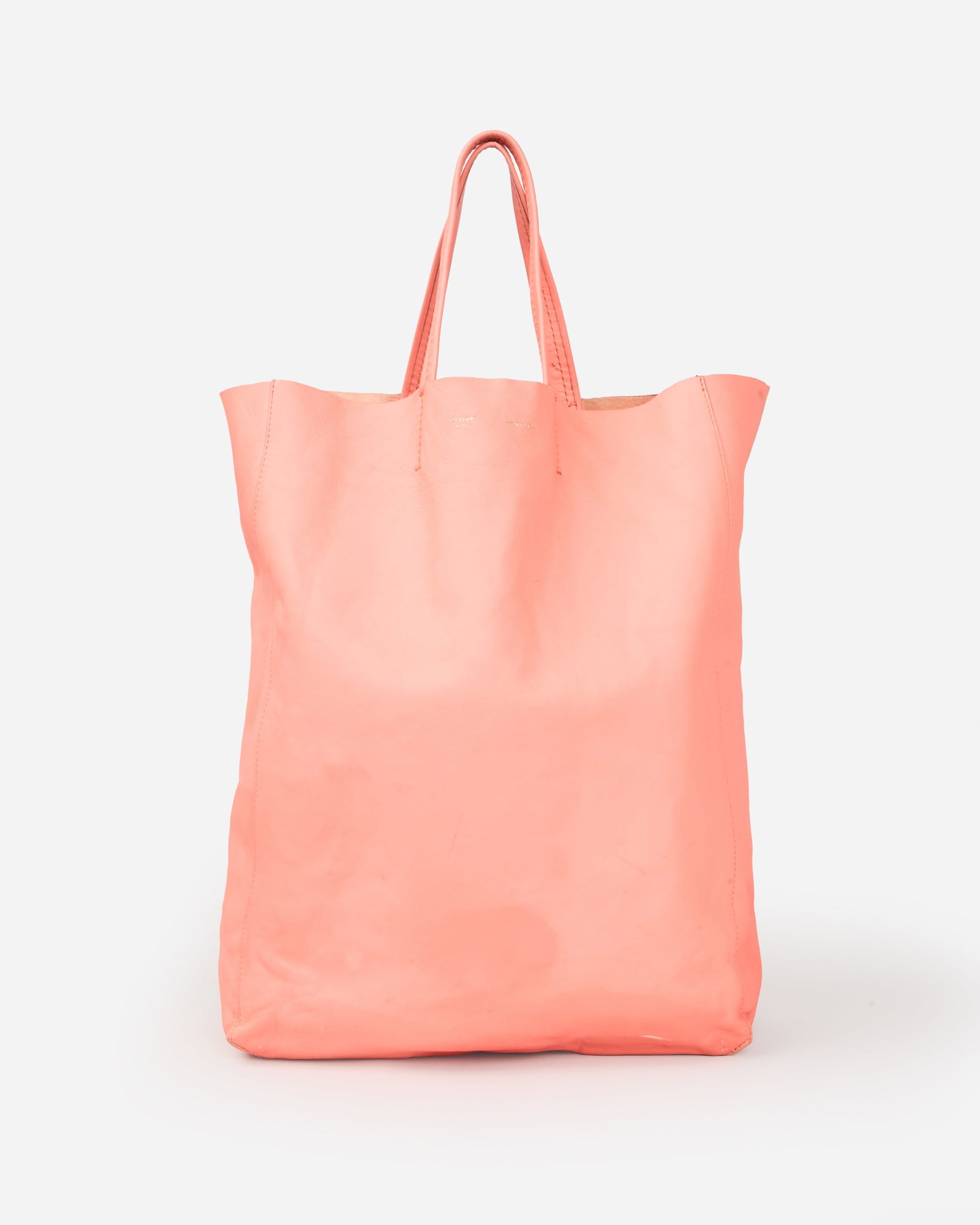 Céline | Orange Leather Vertical Cabas: This is a soft grained leather orange cabas with top handles. This was designed during Phoebe Philo's tenure as creative director of the brand Céline. From the collection of Cameron Silver. The