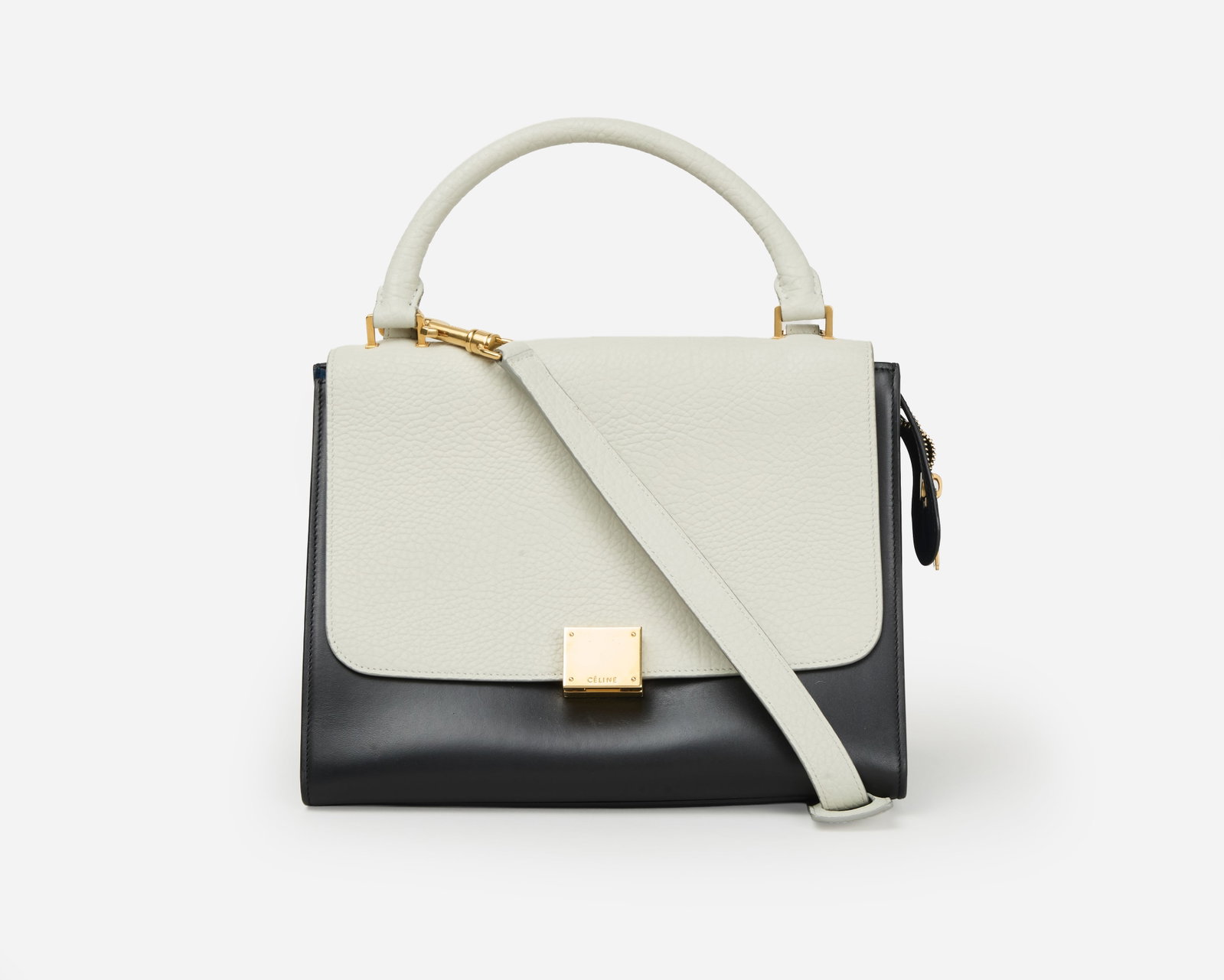 Céline | Tri-Color Leather Trapeze Handbag: Céline tri-color leather Trapeze handbag designed during Phoebe Philo's tenure as creative director. Structured three-tone leather top-handle bag featuring a black leather body, textured ivory 
