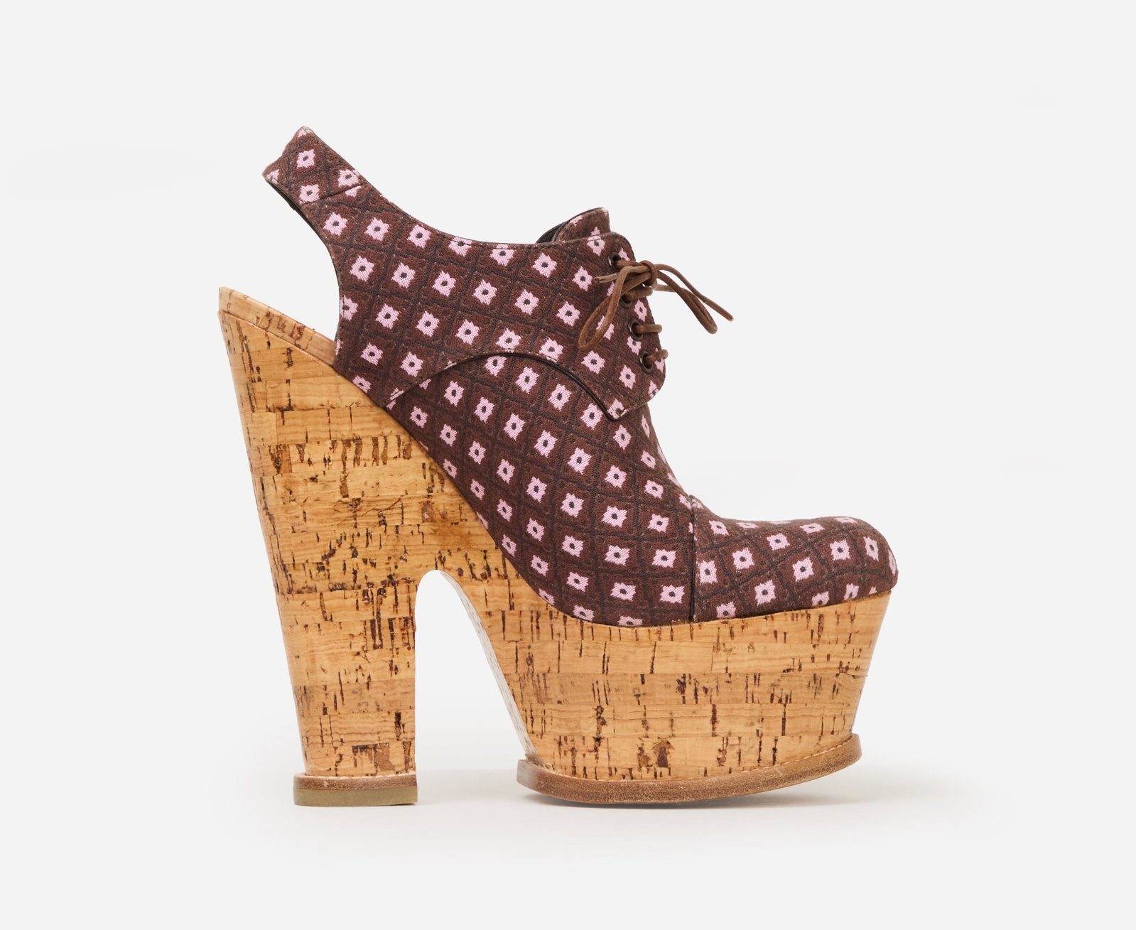 Louis Vuitton | 2013 Resort Marc Jacobs Era Cork Wedges: Louis Vuitton cork wedges from the 2013 Resort collection By Marc Jacobs & Julie de Libran (look 13), modeled by Andie Arthur.The purple lace-up platform wedge pumps feature an allover geometric jacqu