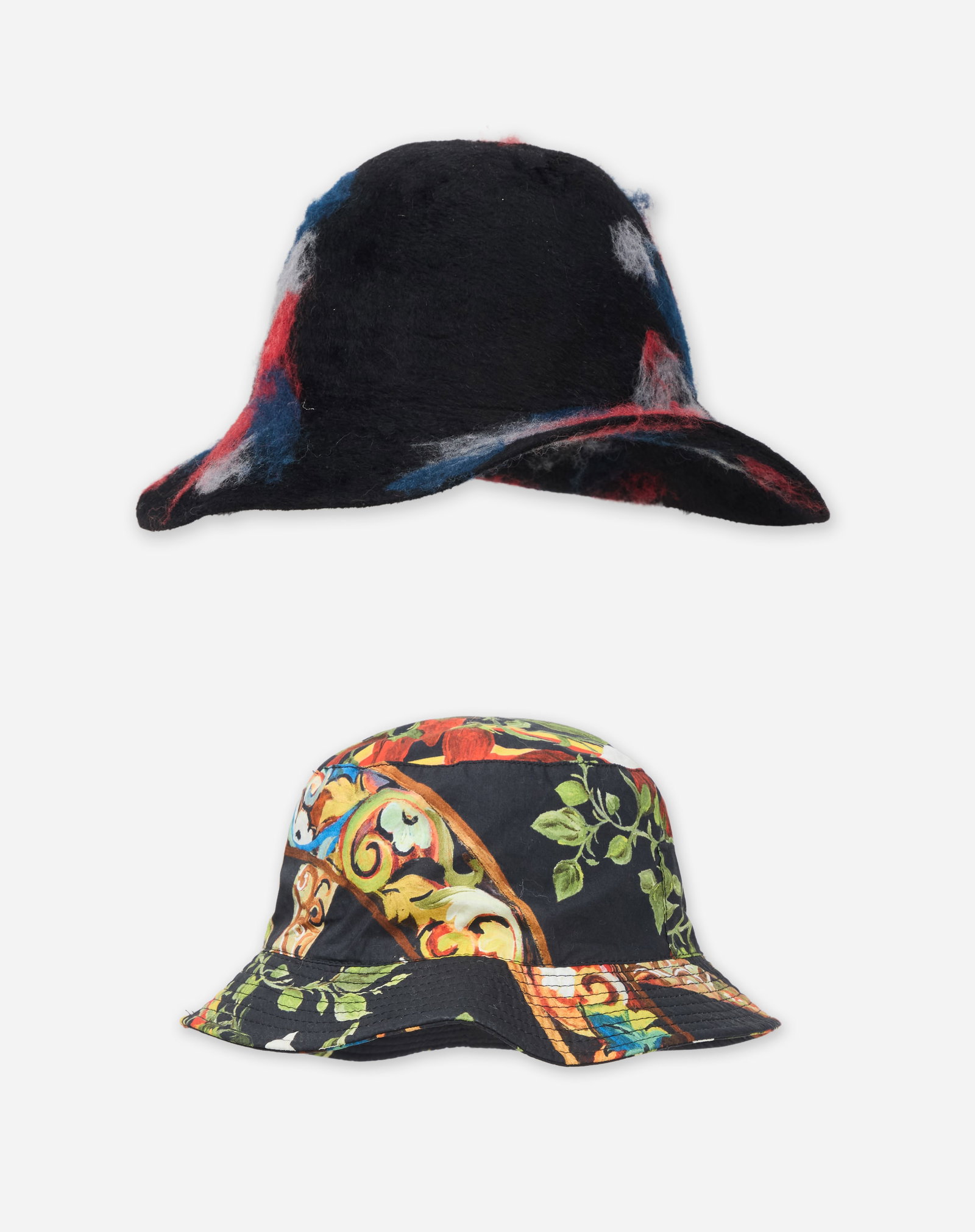Designer Hats | Dolce & Gabbana Atla Satoria Bucket Hat and a Yohji Yamamoto Hat: Two designer hats featuring a Dolce & Gabbana Atla Satoria bucket hat and a Yohji Yamamoto wool cloche-style hat from the collection of Cameron Silver. The Dolce & Gabbana hat is composed of 100%