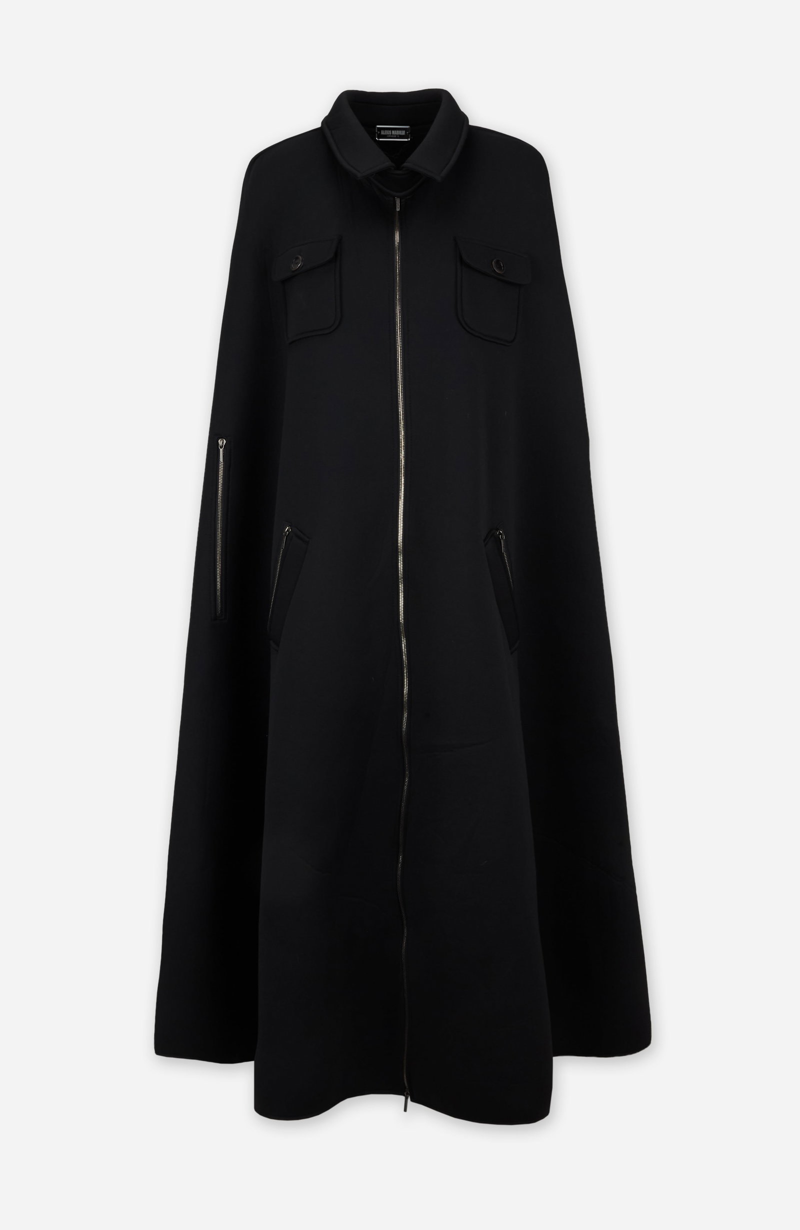 Alexis Mabille | 2011 Fall Black Cape: Alexis Mabille black cape from the Fall/Winter 2011 menswear runway collection, (look 23) from the collection of Cameron Silver. The neoprene full-length cape features a pointed short collar, a front