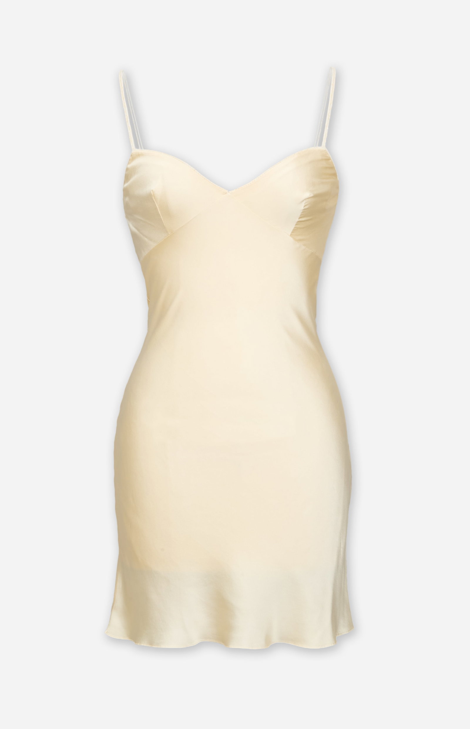 Dior | 1998 Galliano Spring Summer Slip Dress: A cream silk slip dress with beaded straps designed by John Galliano for the spring/summer 1998 Dior ready-to-wear runway show.?A bias-cut cream silk slip-dress with a seamed, cup bustline, and dual
