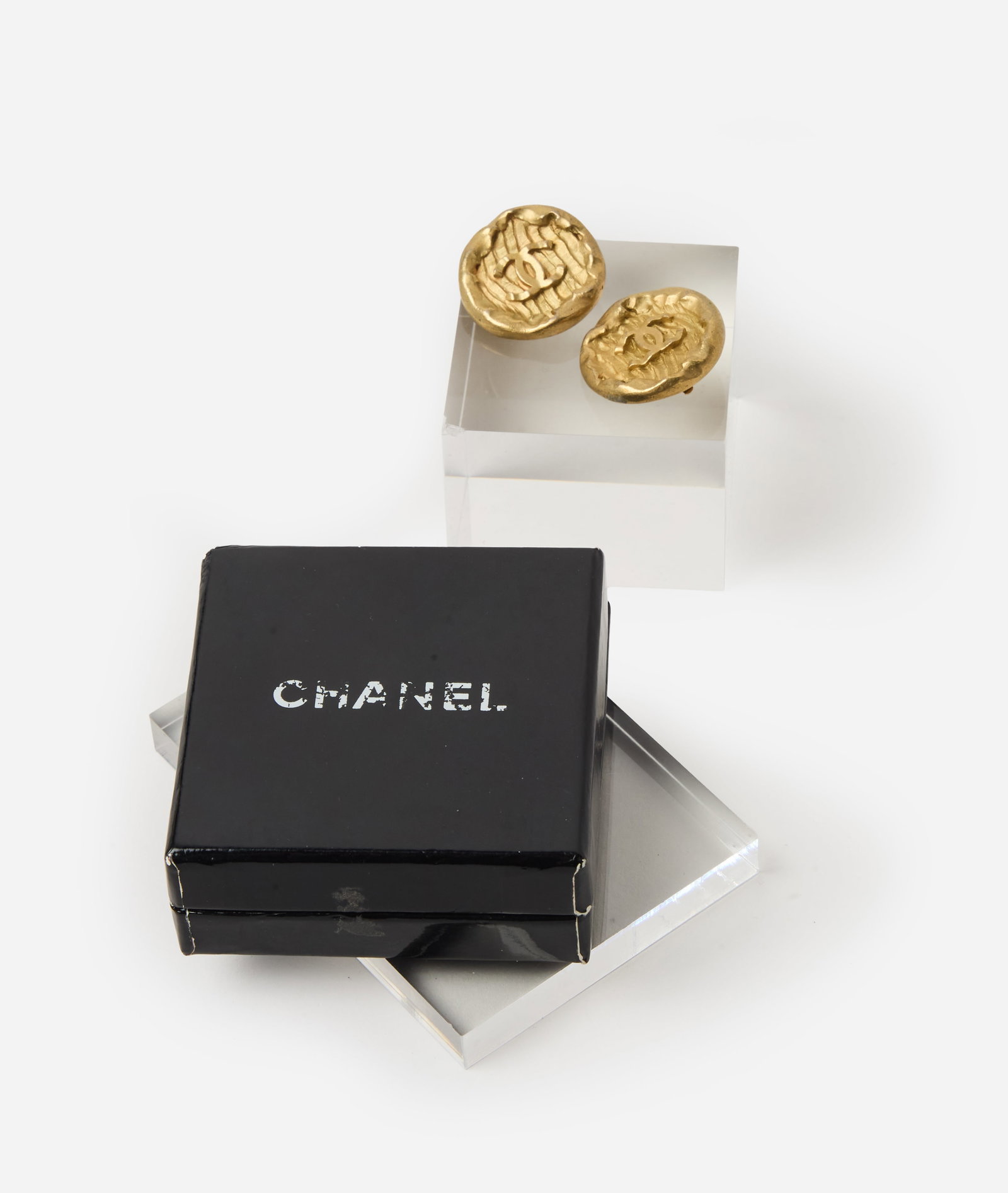 Chanel | 1994 Spring Clip-On Earrings: Chanel clip-on earrings designed as a flexible baguette and brilliant rhinestone and silver tone necklace, the front suspending an articulated fringe, with hook closure. Measuring 16 inches. Marked "C