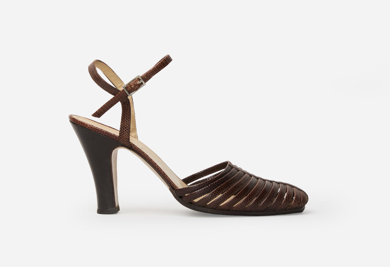 Carolyn Bessette Kennedy | 1990s Bottega Veneta Stiletto Sandals: A pair of Bottega Veneta brown lizard strappy sandals belonging to Carolyn Bessette Kennedy. The shoes feature a court heel with ankle straps and strappy vamps. Both in and outer soles are leather