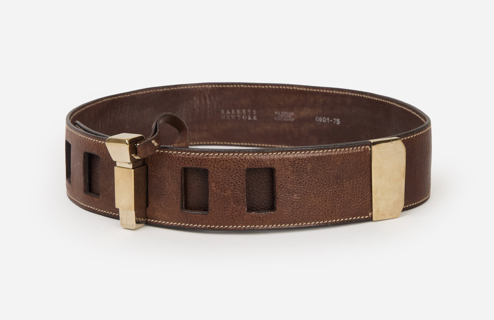 Barney's New York | Brown Leather Belt: Barney's New York brown leather wide belt. The belt features tonal white edge stitching, brown edges, and gold-tone hardware. The design is accented by square belt holes that connect to a rectangular