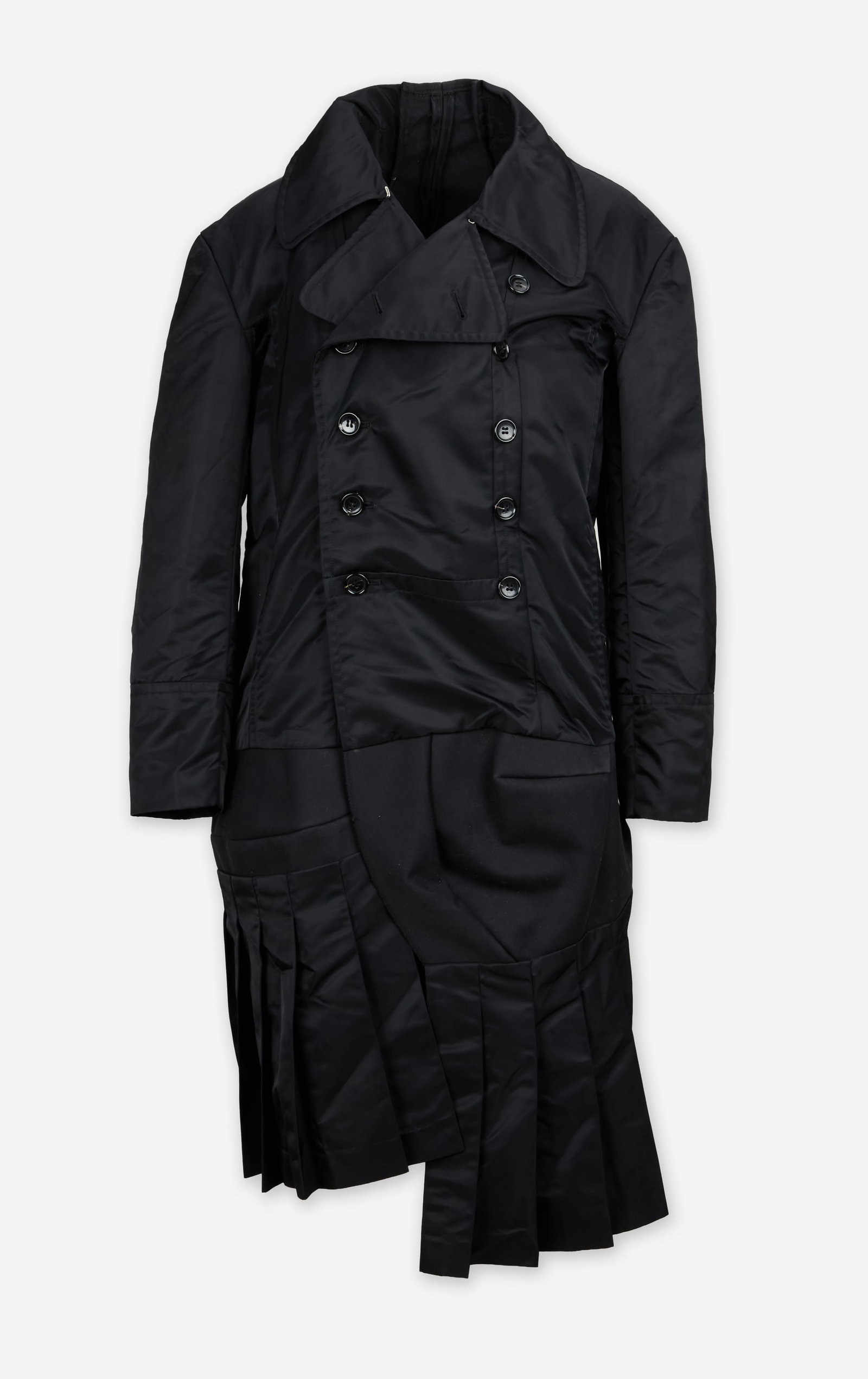 Comme des Garcons | 2008 Nylon Trench Coat: Comme des Garcons deconstructed black nylon trench coat designed by Rei Kawakubo dated 2008. A double-breasted trench with a notch lapel wide collar and box pleated hem. Kawakubo's design of discord