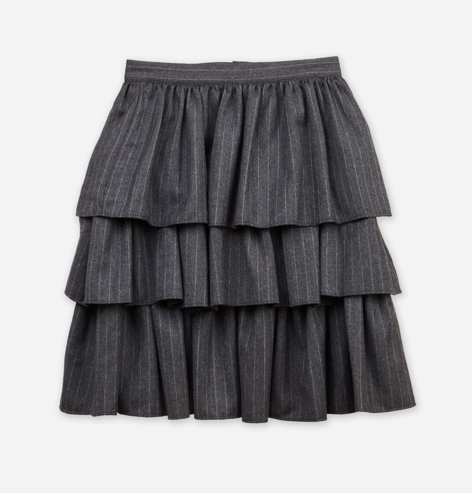 Michael Kors | 1990s Tiered Wool Skirt: This is a grey wool three-tiered mini-skirt designed by Michael Kors circa 1990s. The skirt sits at the natural waistline and has a pinstripe pattern. A label is sewn on the interior of the