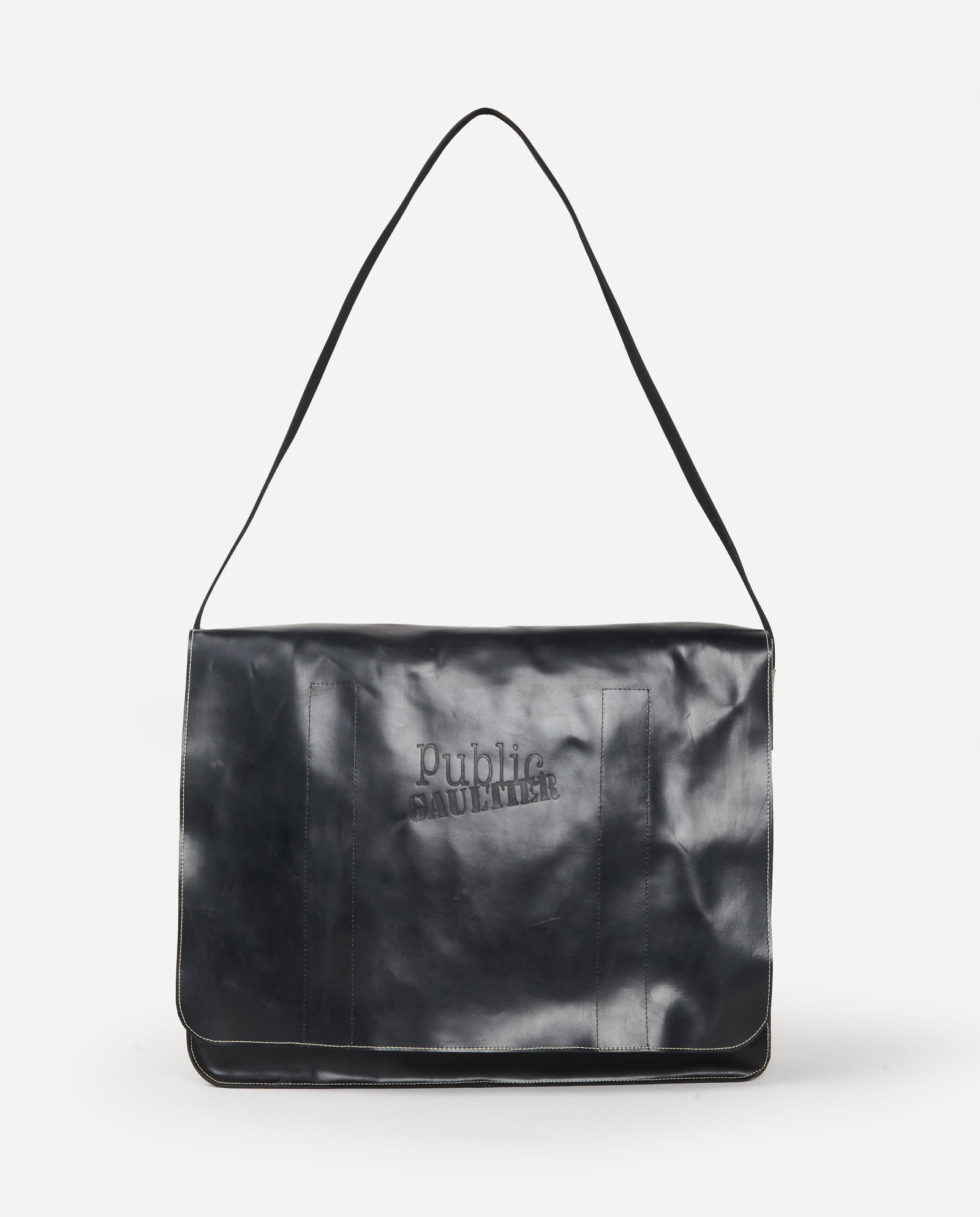 Jean Paul Gaultier | 1980s Public Oversized Messenger Bag: This is an oversized synthetic messenger bag designed by Jean Paul Gaultier's Public circa late 1980s. From the collection of Cameron Silver. The bag features a web strap with a Velcro closure on the