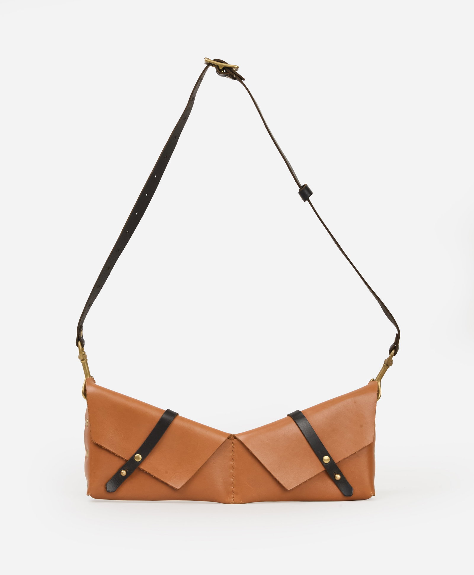 Envelope-Style | Leather Shoulder Bag: Envelope-style leather shoulder bag that folds in half. The tan leather bag features an elongated silhouette with overlapping geometric flap panels secured by brown leather strap closures and