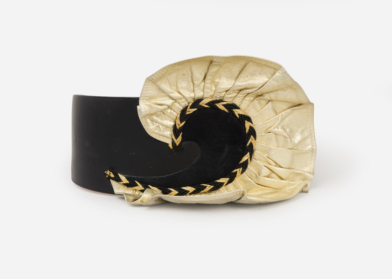 Vintage Accessory | 1980s Wide Leather Belt: This is a vintage black leather belt with metallic gold accents designs in the 1980s. The belt sits at the natural waistline and has a hook-and-eye closure at the back. The front features a feather