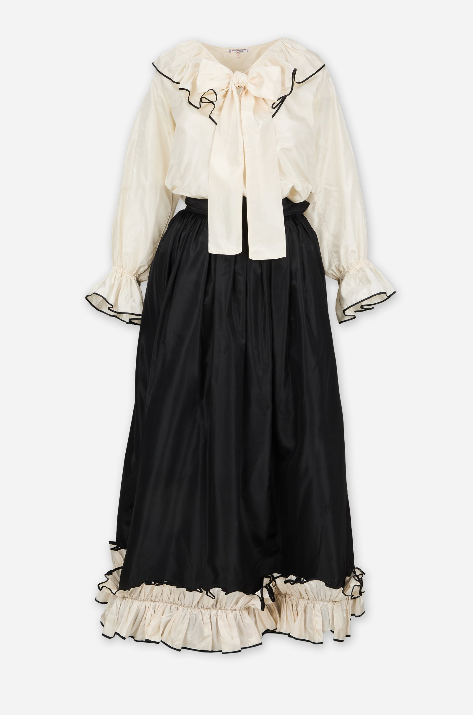Saint Laurent | Ballet Russe Two-Piece Skirt Ensemble: Saint Laurent Rive Gauche ballet russe two-piece blouse and skirt ensemble circa 1976 from the collection of Cameron Silver. White blouse featuring a gathered ruffle collar with contrasting black