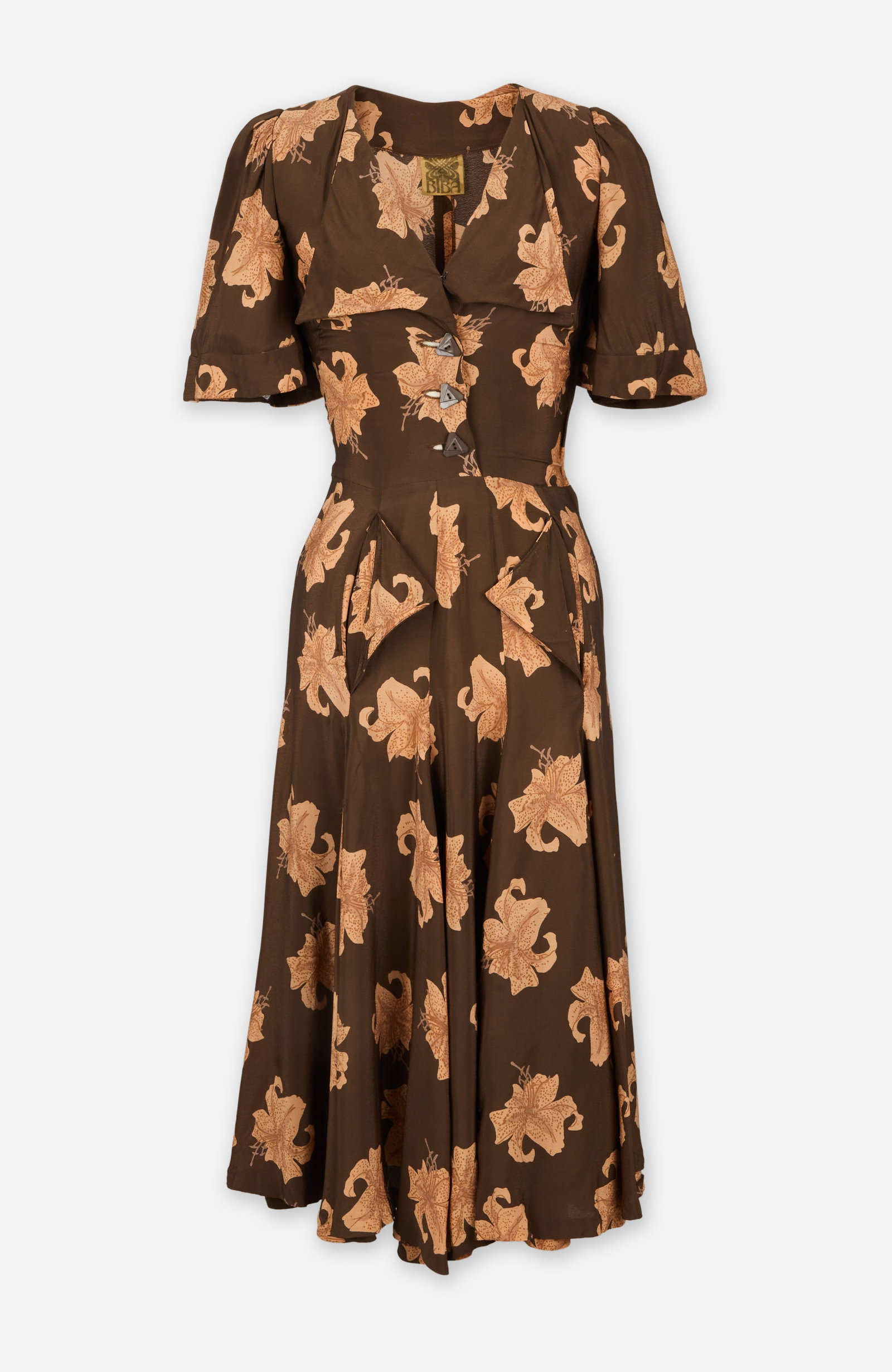 Biba | 1970s Tiger Lily Print Floral Dress: Biba patterned crepe dress circa 1970s from the collection of Cameron Silver. The brown full-length dress is composed of rayon and features an allover tiger lily floral print with a deep V-neckline