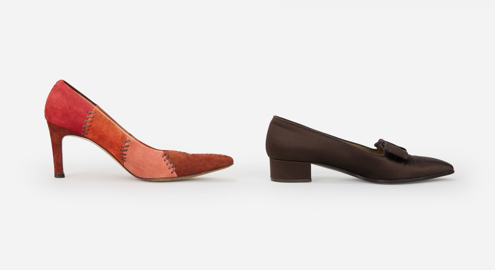 Designer Shoes | Two Pairs, One Ferragamo, One Yves Saint Laurent: A grouping of two pairs of designer heels, one pair is a pair of tonal suede Ferragamo heels with pointed toes, and the second is a pair of YSL brown satin block heels. The Ferragamo heels are in an o