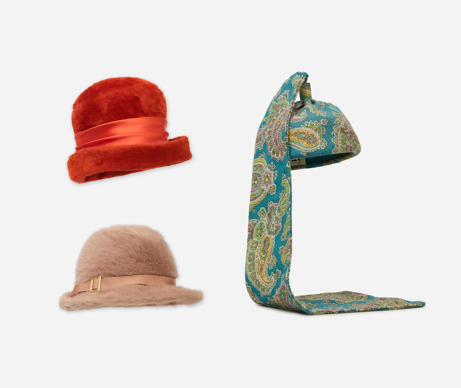 Group of Vintage Hats | 1960s Adoldo II, Patrice, and Kangol: A group of three vintage hats cera 1960s featuring a Adoldo II paisley hat with a detachable scarf, a Patrice orange faux fur hat, and a Kangol dusty pink angora fedora. The Adolfo II pouch-style hat