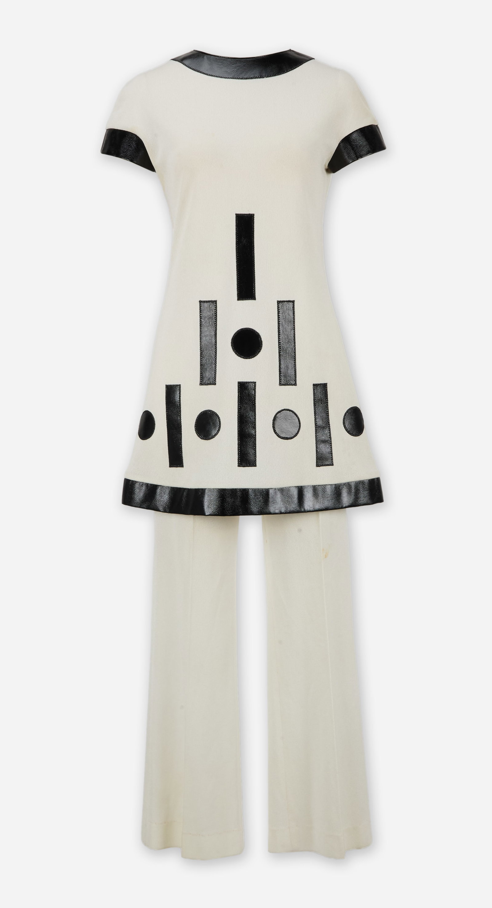 Happy Girl | 1960s Two-Piece Ensemble: Happy Girl 1960s two-piece ensemble from the collection of Cameron Silver. The ensemble is composed of polyester. White short-sleeve mid-length shift blouse featuring a classic jewel neckline with