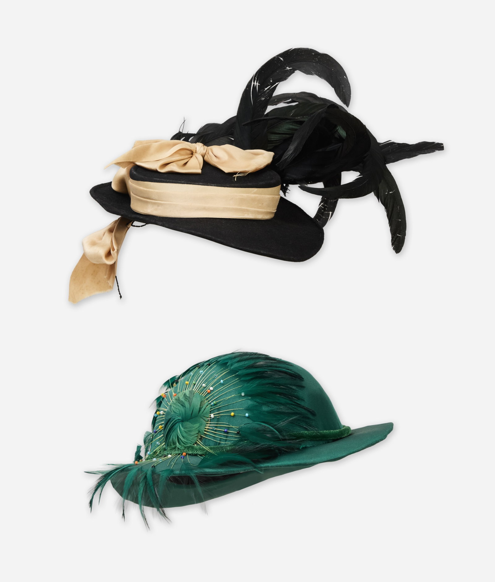 Designer Hats | Braagaard & Oscar de la Renta: A set of two designer hats, one from Braagaard and the other Oscar de la Renta. Braagaard black wool fascinator with feathers. The crown is wrapped with a wide champagne satin band and accented with