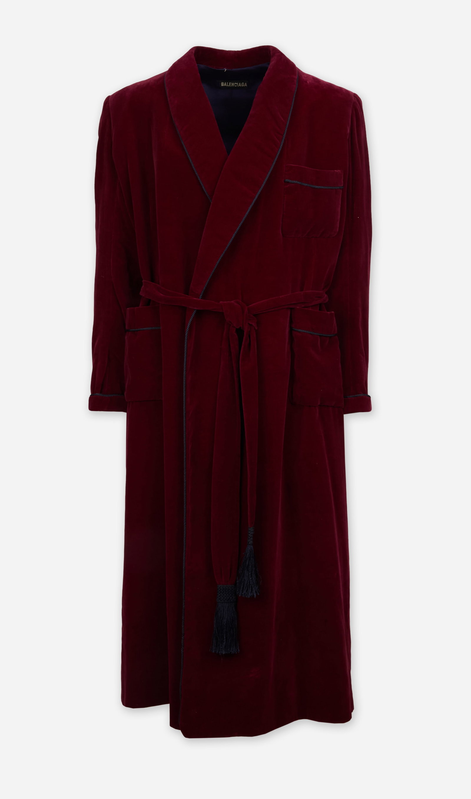 Balenciaga | 1960s Haute Couture Burgundy Velvet Smoking Robe: Balenciaga Haute Couture burgundy velvet full-length smoking robe, circa 1960s from the collection of Cameron Silver. The robe has a shawl collar trimmed in black piping. The open-front design is