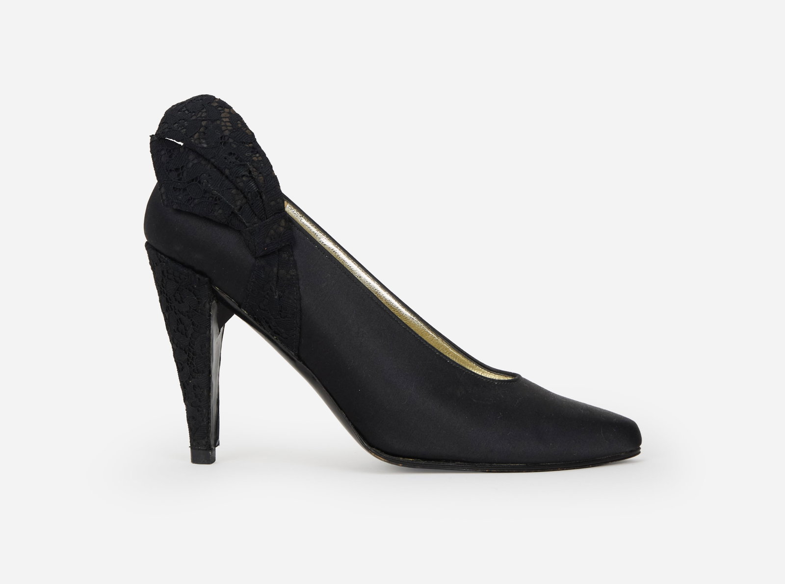 Charles Jourdan Paris | Black Satin Pumps: A pair of Charles Jourdan Paris black satin pumps with Chantilly lace wrapped heels and lace (bow-like) accent on the exterior ankle. Both shoes are lined with metallic gold leather in soles and black