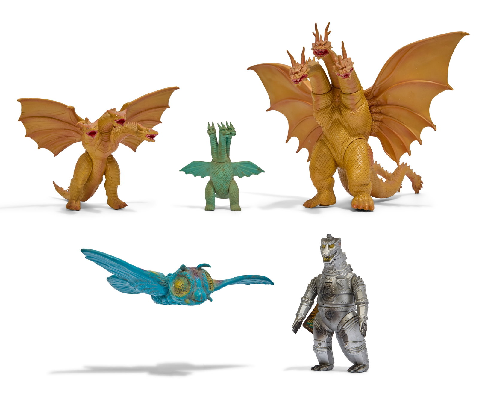 Sofubi | Vintage Godzilla Kaiju Figures (5): A group of five vintage Godzilla kaiju figures, including Mothra (Bullmark), Mechagodzilla with tag (Bandai), and three unmarked King Ghidorah of various sizes and styles. From the Estate of Sompote