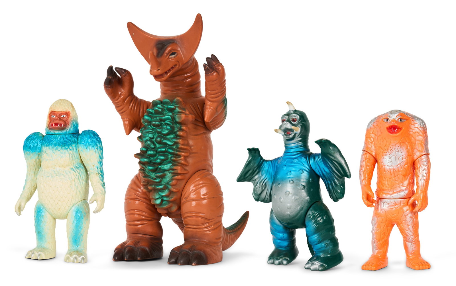 Sofubi | Vintage Bandai Kaiju Figures (4): A group of four vintage Bandai Bullmark Kaiju figures, including Gigas, Jamila, Peguila, and Gomora. From the Estate of Sompote Sands