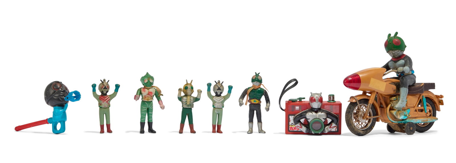 Kamen Rider | Vintage Figures and Collectibles (10): A collection of ten vintage figures and collectibles of characters from the Kamen Rider franchise. Includes: -1974 Popy Jumbo Machinder Kamen Rider X Figure -Kamen Rider with Bullmark Cyclone Motorcyc