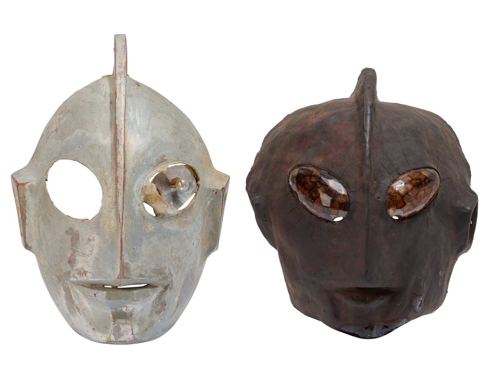 Ultraman | Original 1966 Mask Prototypes by Tohl Narita (2) with Framed Photo: Two, original, 1966 prototypes for the Ultraman mask, created and designed by Tohl Narita. Narita worked with sculptor Akira Sasaki to create the original masks for the character of Ultraman at this t