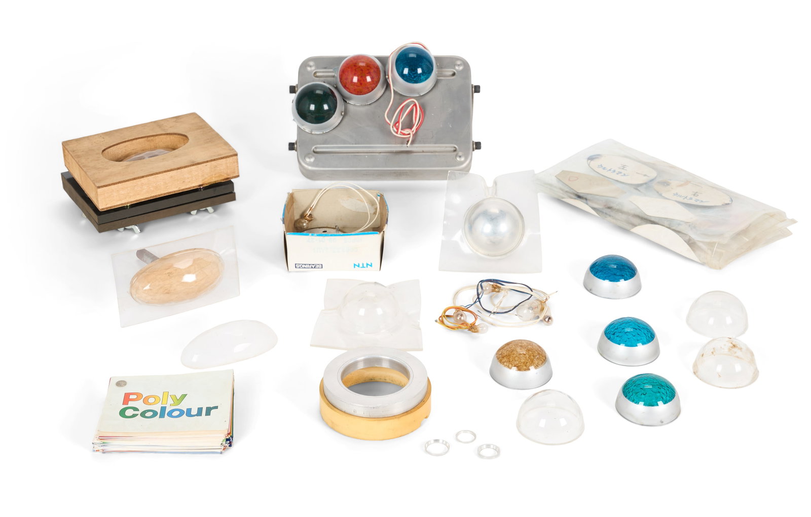Ultraman | Eyepiece and Color Timer Components: A large collection of items relating to the creation of Ultraman eyepieces and Color Timers. Includes molds and shape formers for Color Timers and eyepieces including pieces made of plastic, metal,