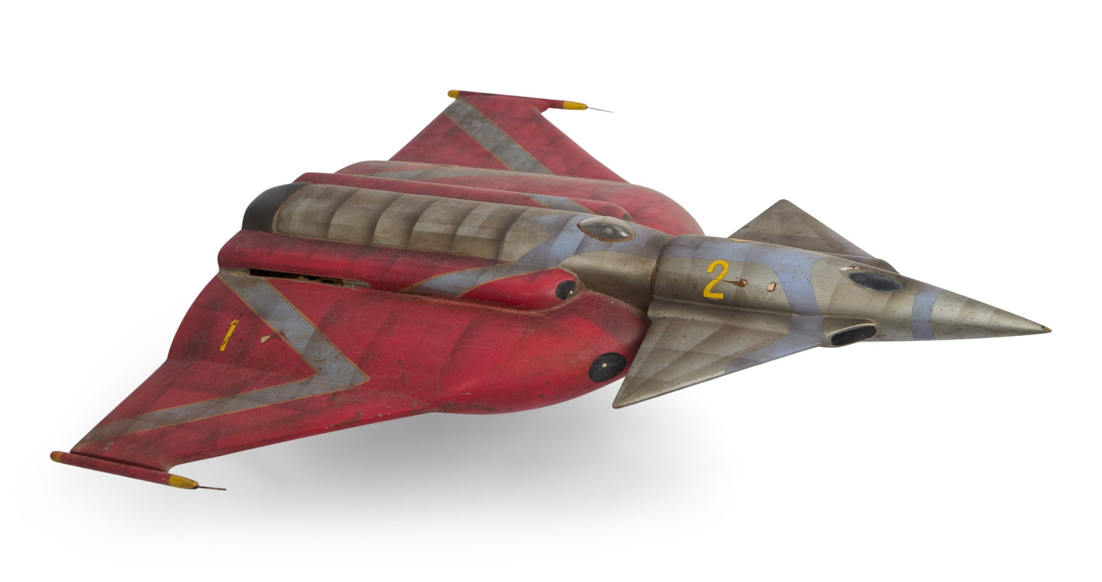 Mirrorman | ?Jumbo Phoenix" Fighter Jet Miniature: An original "Jumbo Phoenix" fighter jet miniature from the production of the superhero/kaiju series Mirrorman (Fuji Television, 1971-1972). The jet is comprised of resin with metal components and hand