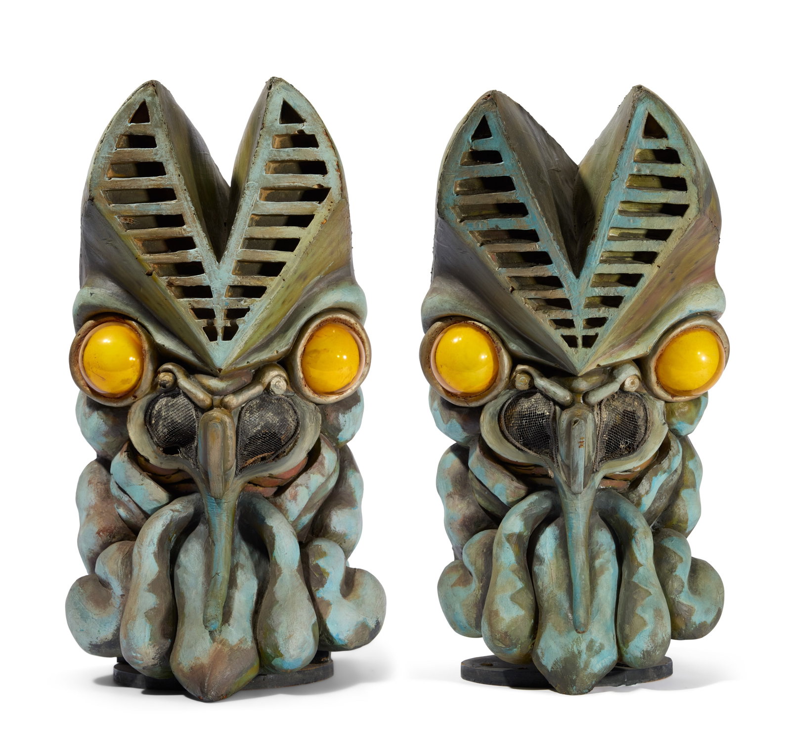 Ultraman | Alien Baltan Live Show Headpieces (2): Two Alien Baltan headpieces from costumes from Ultraman live stage shows circa 2000s+. Each headpiece is comprised of foam latex with plastic shell eyepieces. Multiple buckles are present inside the