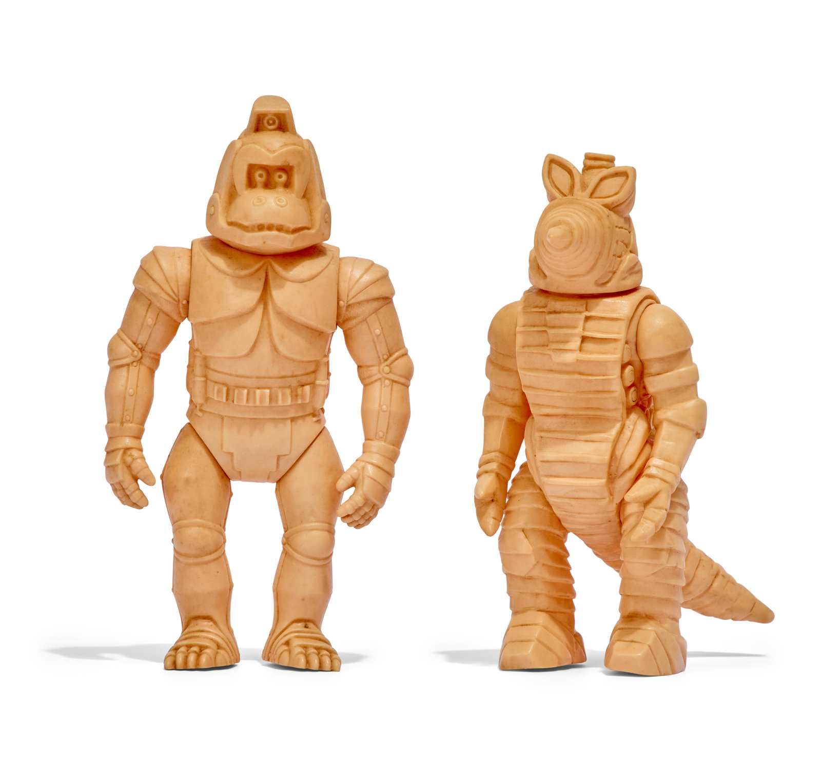 Sofubi | Vintage Bullmark Flesh-Colored Kaiju Figures (2): Two vintage Bullmark flesh-colored kaiju figures. Includes Mechani-Kong and Moguera. From the Estate of Sompote Sands