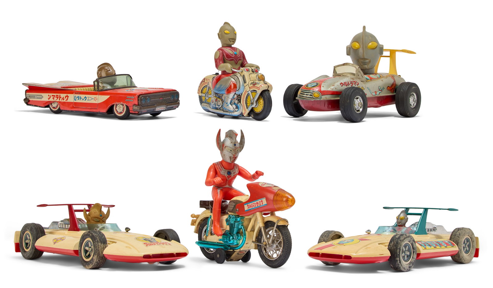 Ultraman | Vintage Car Toys (6): Six vintage car toys featuring characters from various properties in the Ultraman franchise. Includes: -1960s SAN "Ultra Q" Convertible Car with tin car body and rubber/vinyl head -1970s Masuday