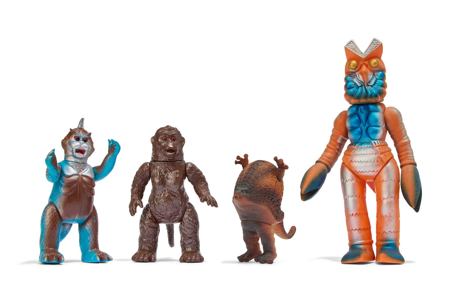 Sofubi | Vintage Bandai Kaiju Figures (4): A group of four vintage Bandai Bullmark Kaiju figures, including Alien Baltan, Gomess, Takkong, and Goro. From the Estate of Sompote Sands