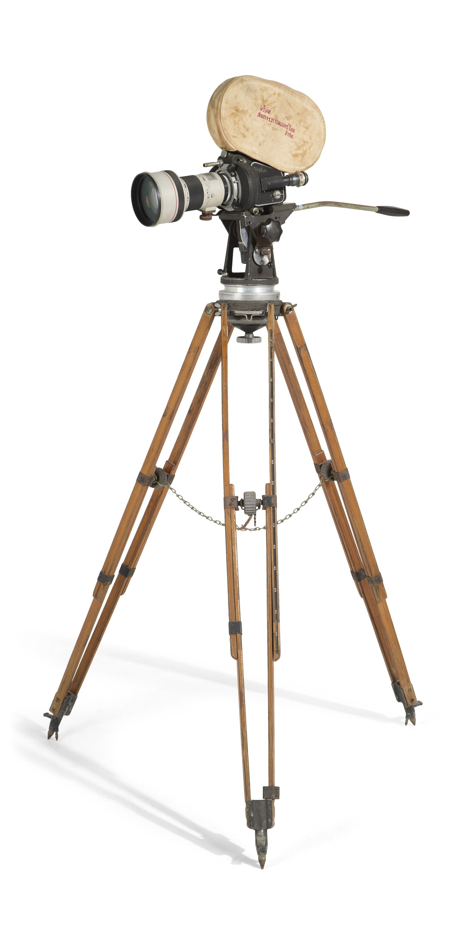 Arriflex | 35mm Motion Picture Camera with Tripod: A vintage ARRI Arriflex IIB 35mm Film Camera, serial number 68639, made in Western Germany. Together with an attached magazine featuring a tan magazine bag with stitched red writing in Thai; a