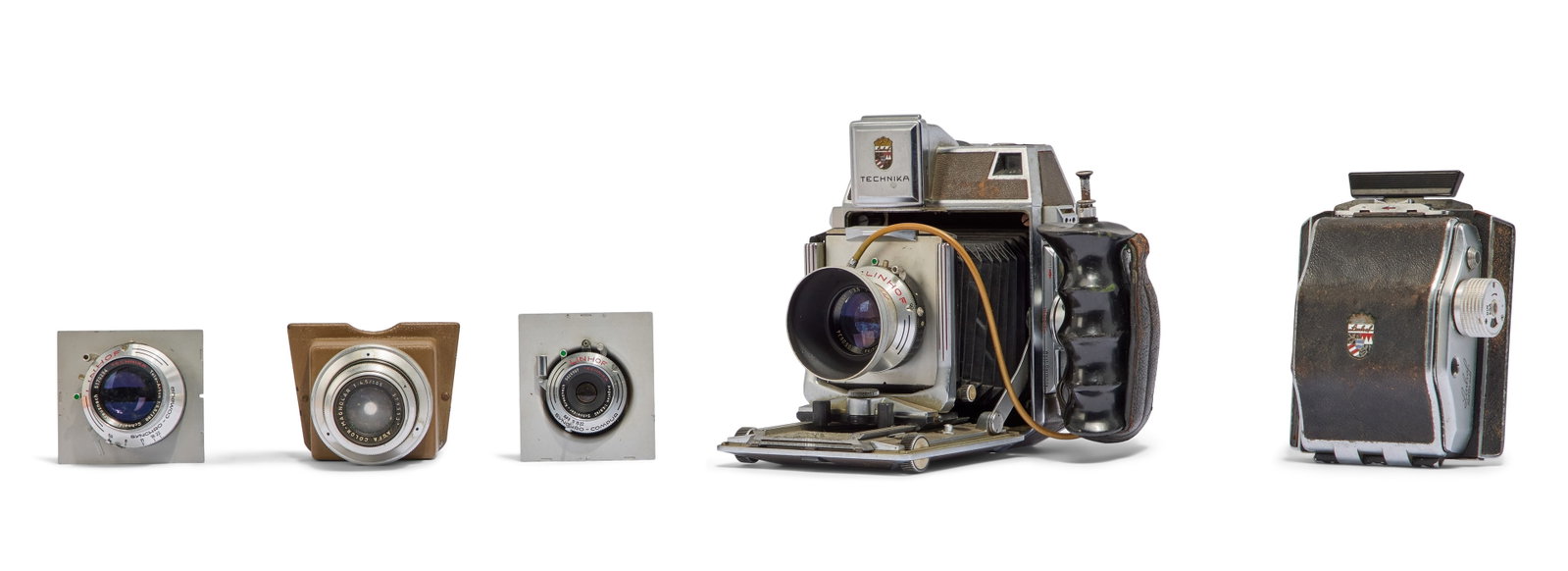 Linhof | Technika DBP APa 120 Film Camera and Accessories: A vintage Linhof Technika DBP APa 120 Film Camera, serial number 81979, made in West Germany. The lens attached is a Carl Zeiss serial number 1550634, 1:3,5, f=105mm. Measures 8 x 8.5 x 9 inches.
