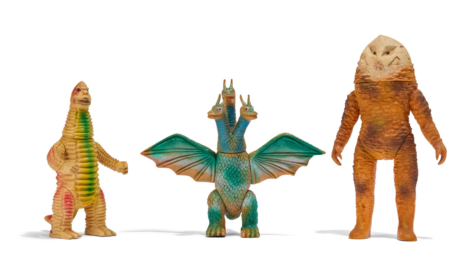 Sofubi | Vintage Kaiju Figures (3): A group of three vintage Kaiju figures, including King Ghidorah (Bullmark), Red King (Bullmark), and Alien Zarab (Bear Model). From the Estate of Sompote Sands
